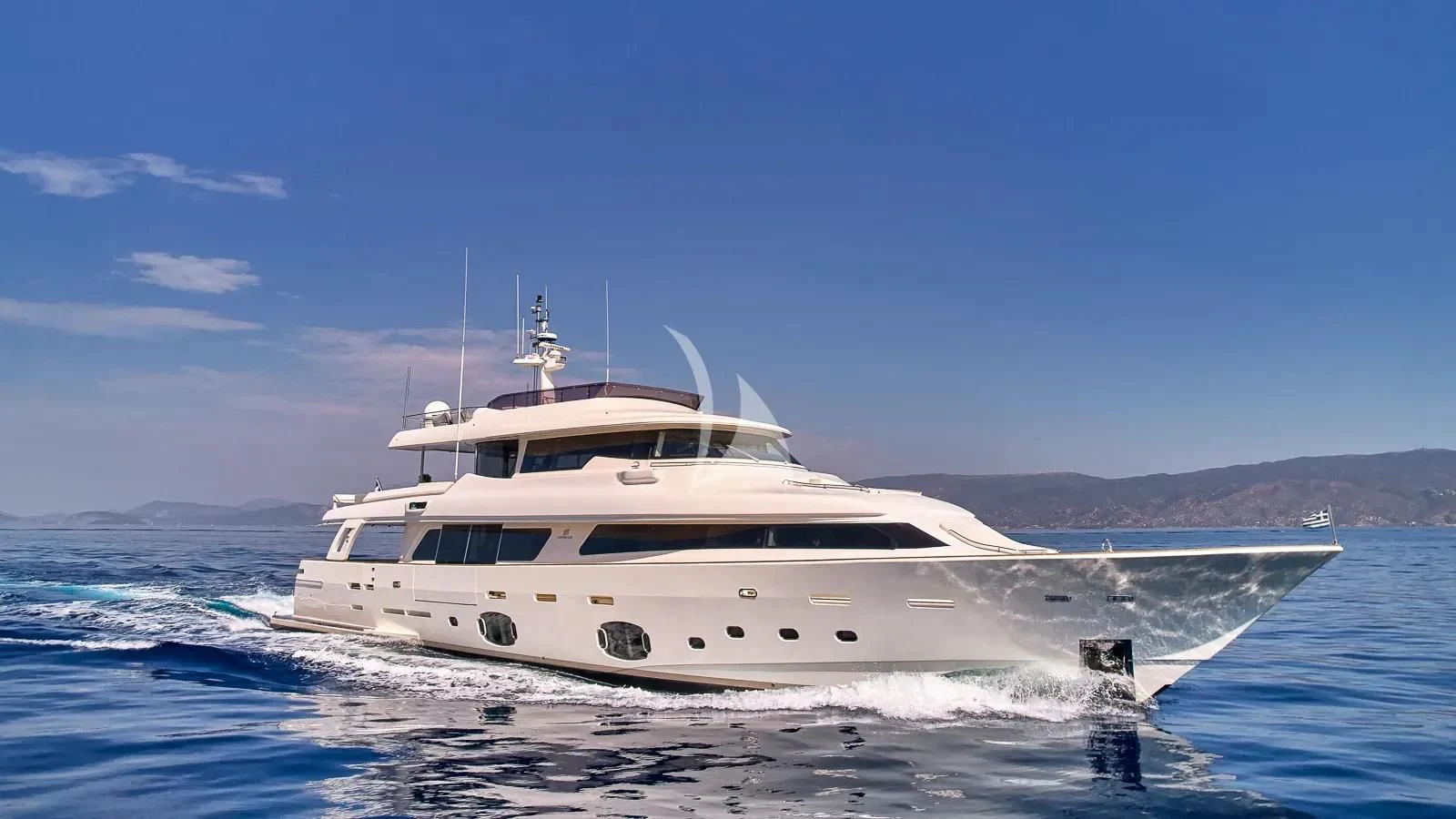 a white yacht on the water aboard DALOLI Yacht for Charter