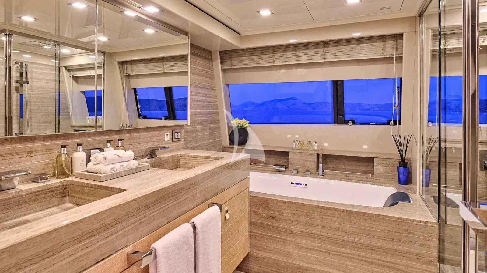 a bathroom with a large jacuzzi tub and a large window aboard DALOLI Yacht for Charter