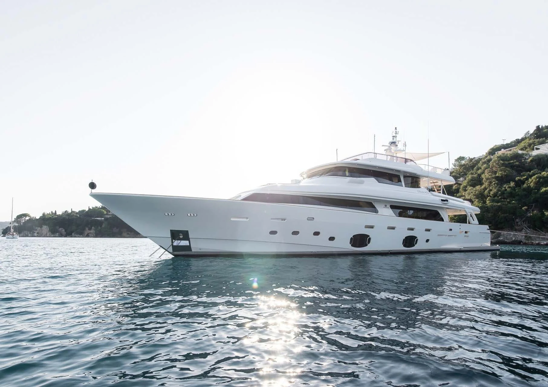 a white yacht on the water aboard DALOLI Yacht for Charter