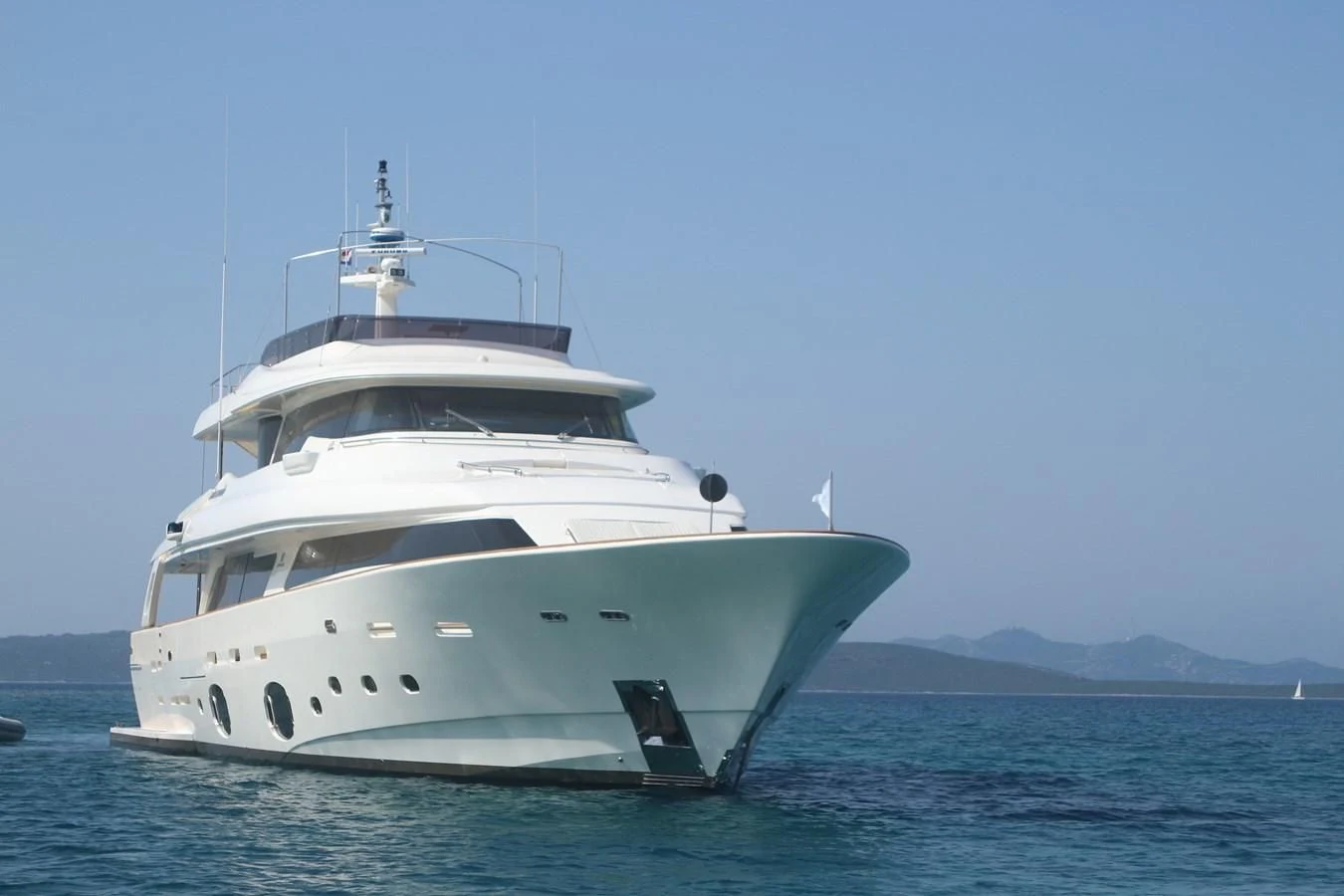 a white yacht in the water aboard DALOLI Yacht for Charter