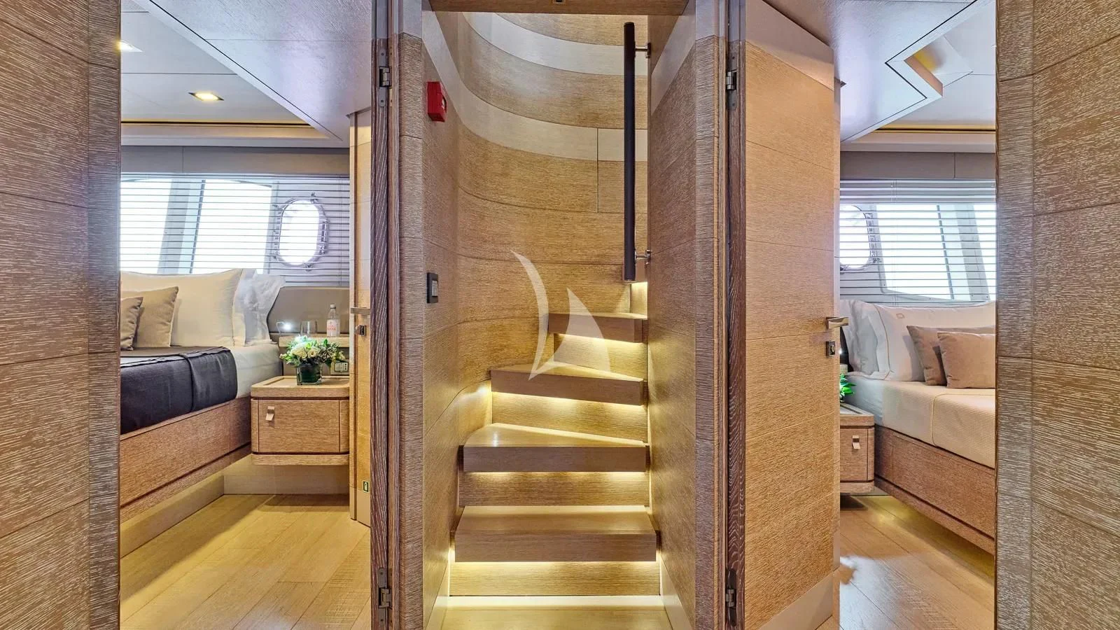 a room with a bed and a couch aboard DALOLI Yacht for Charter