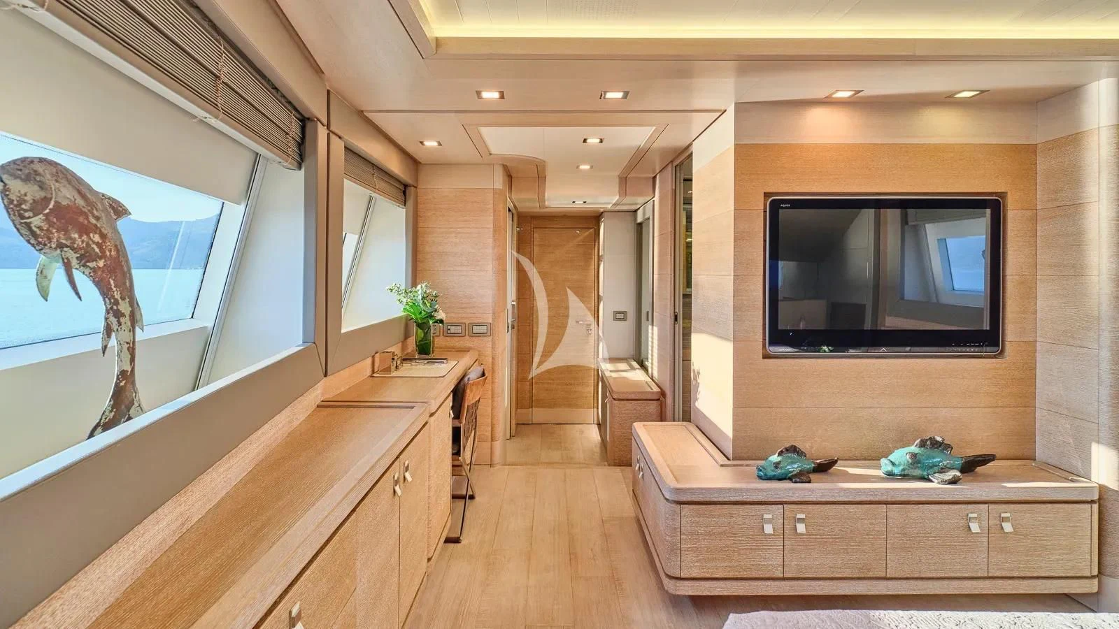 a room with a tv and a counter aboard DALOLI Yacht for Charter