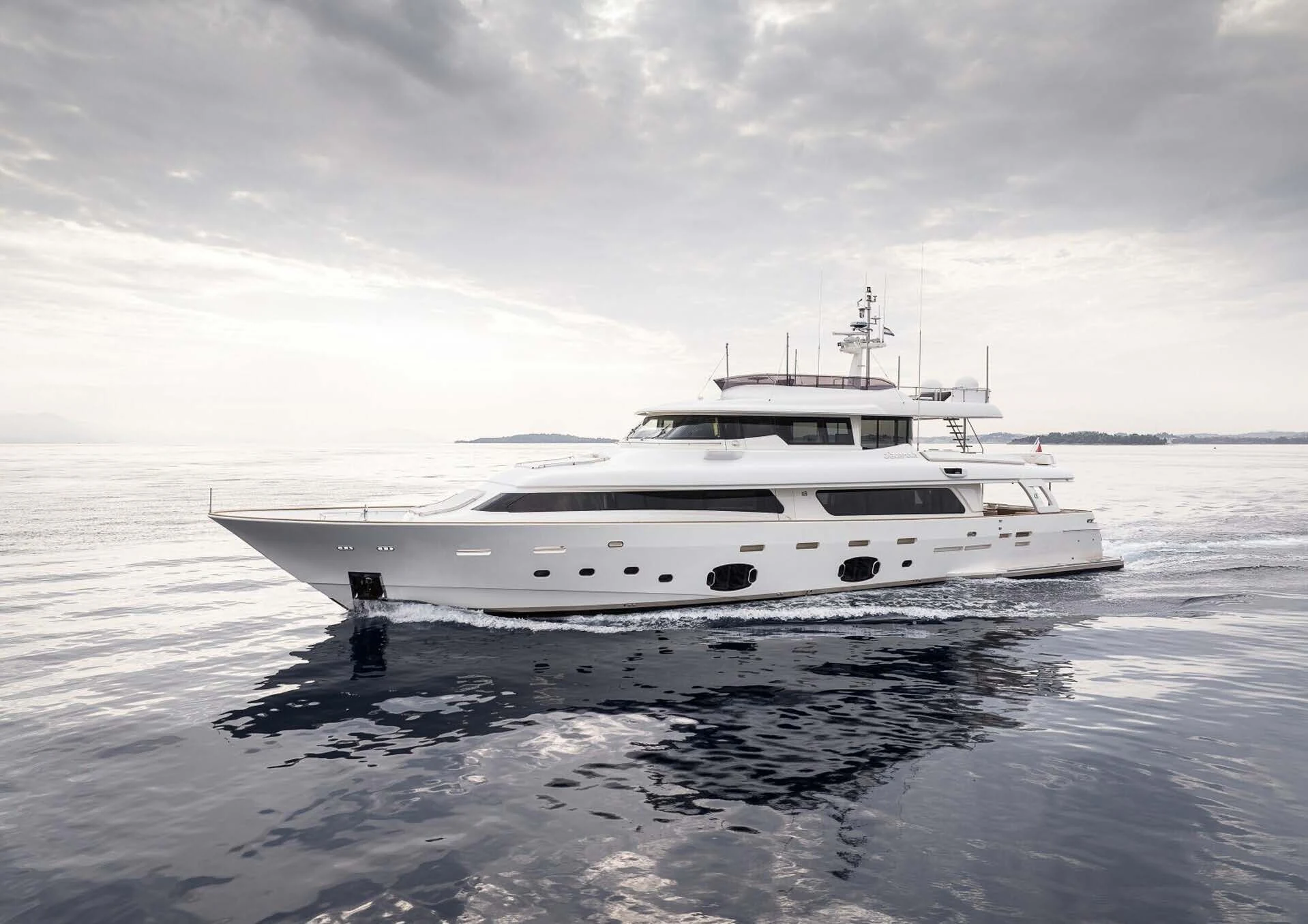 a white yacht on the water aboard DALOLI Yacht for Charter