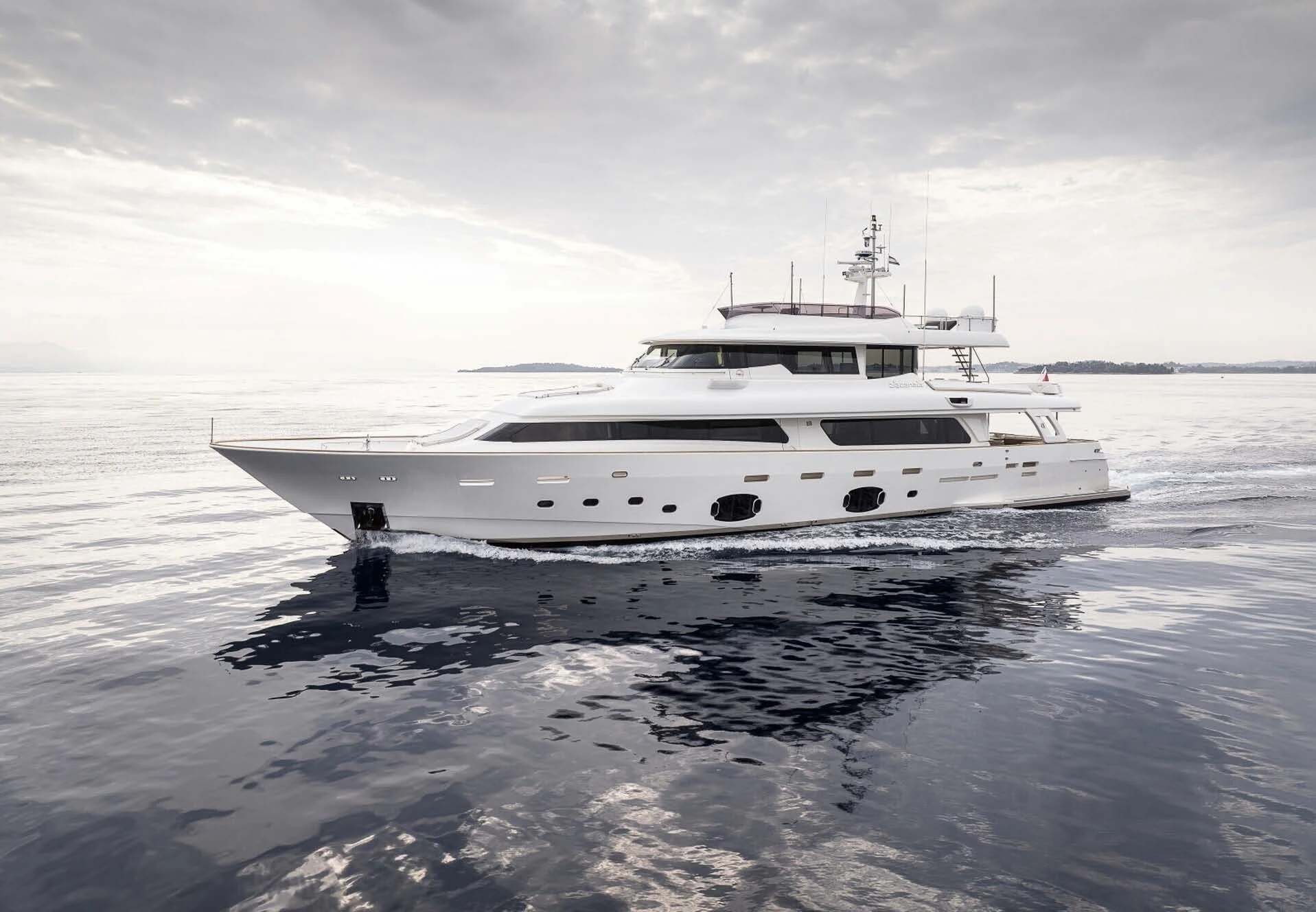 a white yacht in the water aboard DALOLI Yacht for Charter