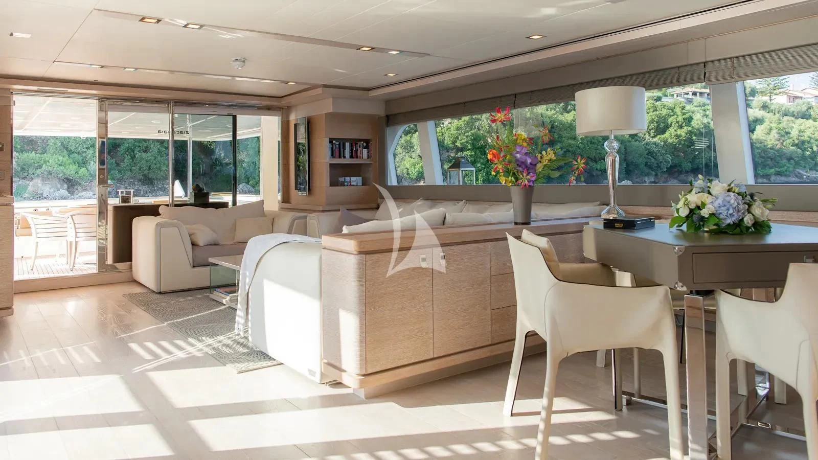 a large room with a couch and a table aboard DALOLI Yacht for Charter