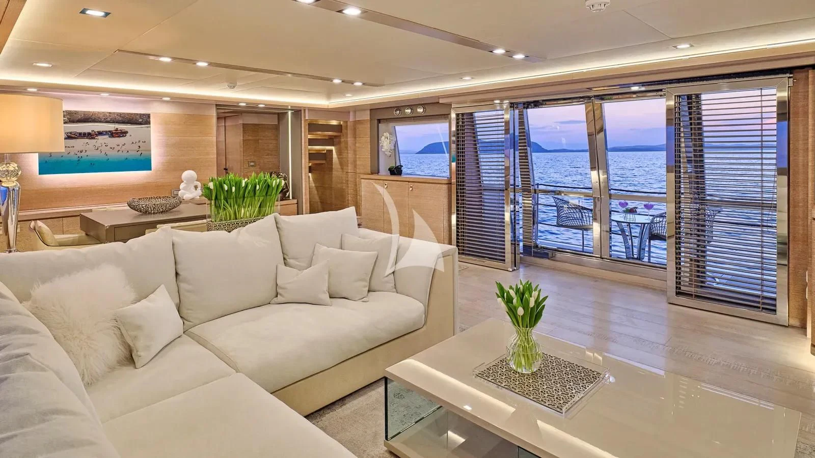 a living room with a large window aboard DALOLI Yacht for Charter