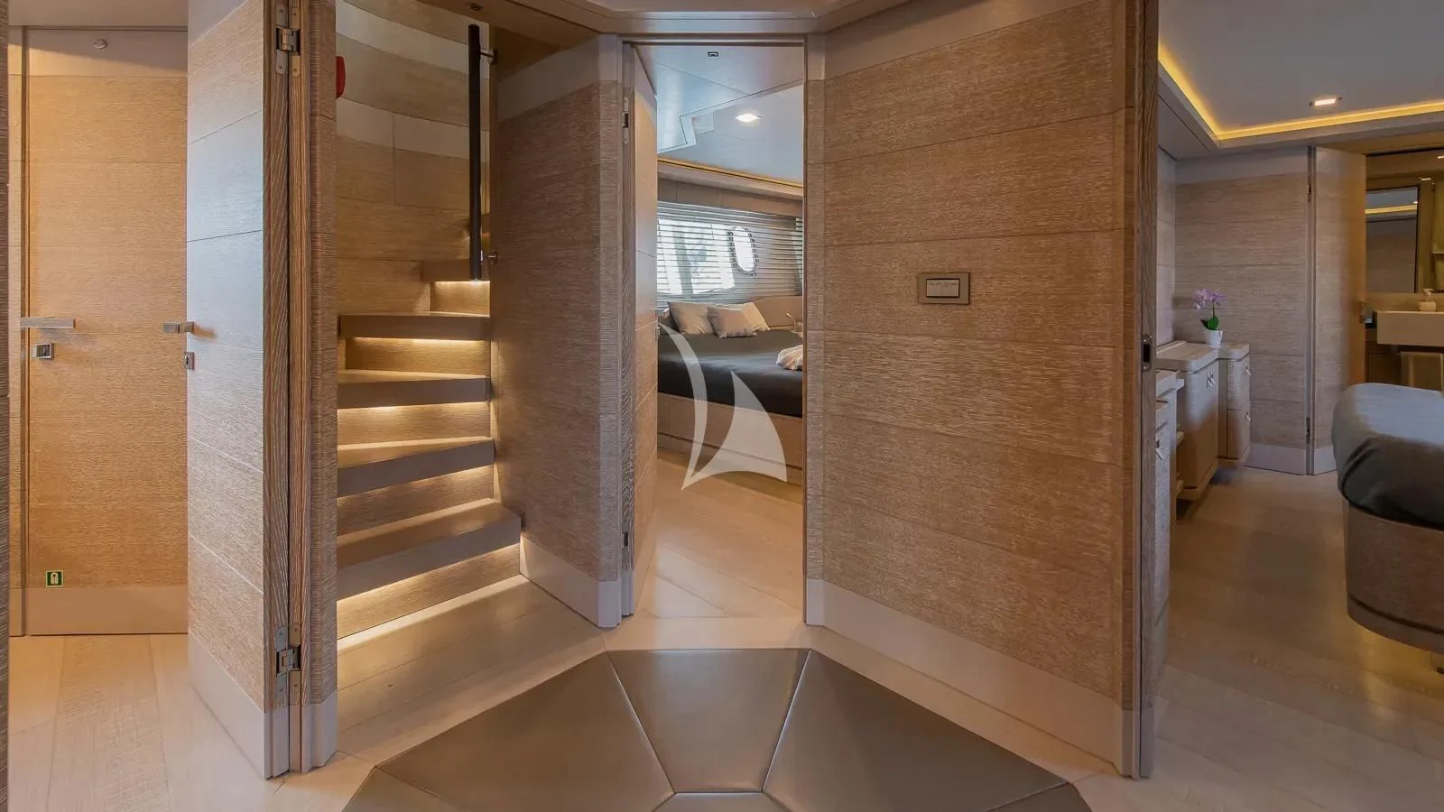a room with a bed and a door aboard DALOLI Yacht for Charter