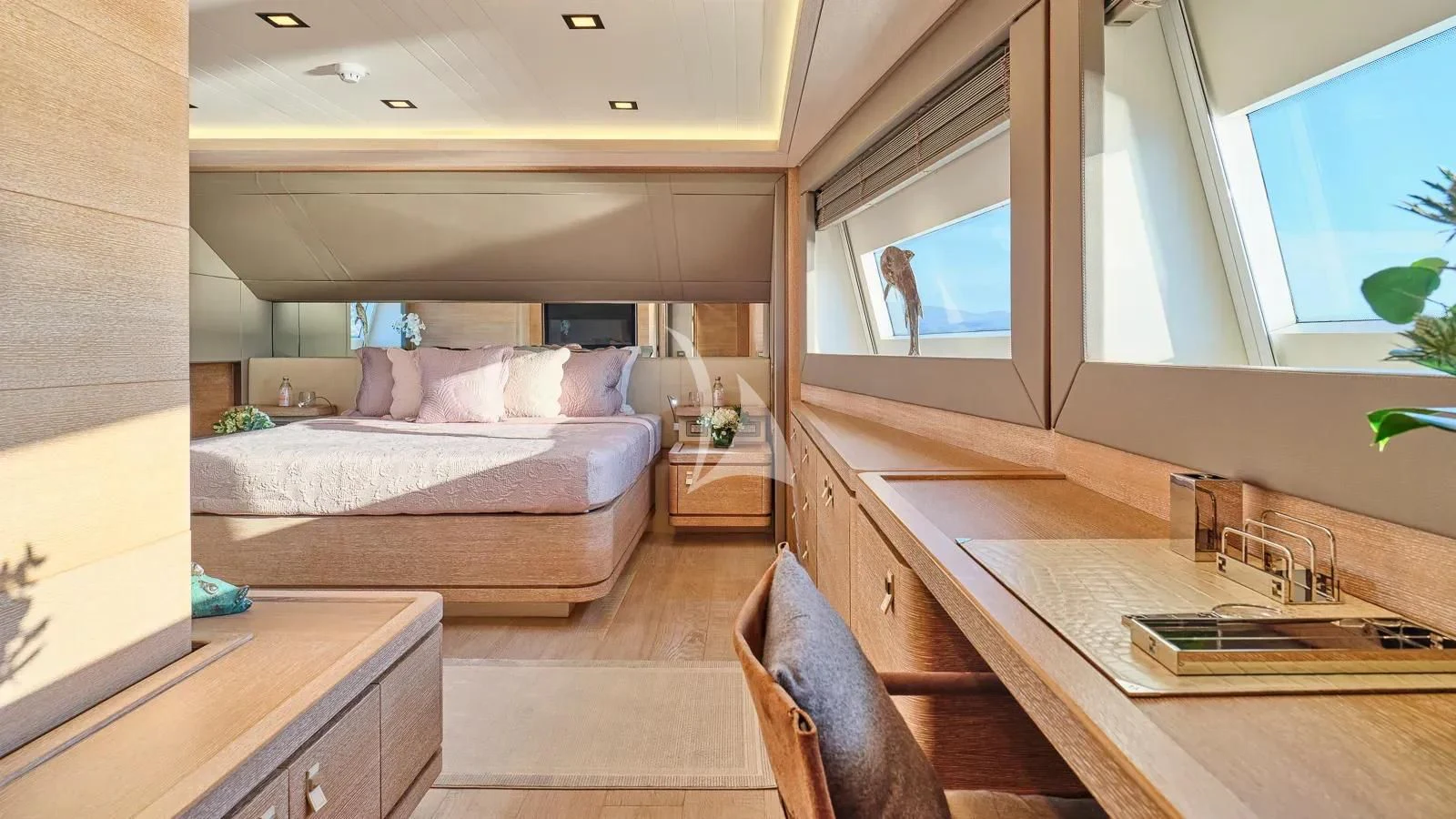 a room with a bed and a desk aboard DALOLI Yacht for Charter