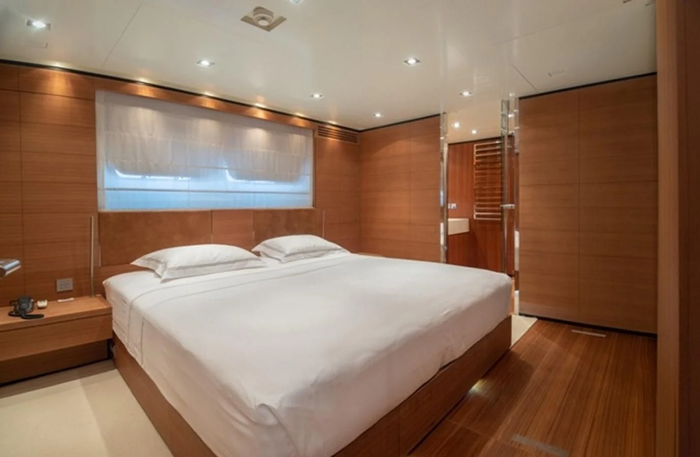 a bed in a room aboard TIN TIN Yacht for Sale