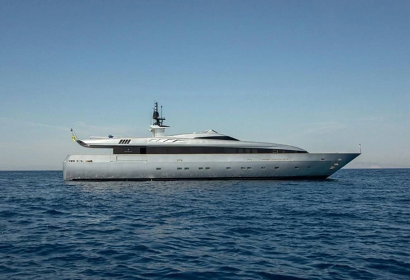 a large ship in the water aboard TIN TIN Yacht for Sale
