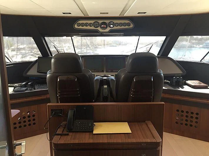 a vehicle with a desk and computer aboard BLUE LINE Yacht for Sale
