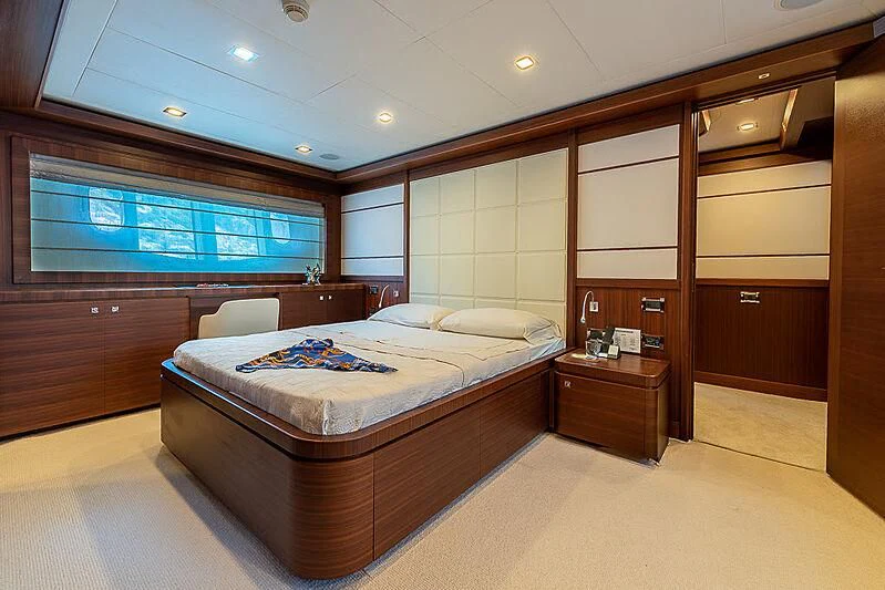 a large bedroom with a bed aboard BLUE LINE Yacht for Sale