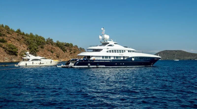 a couple of boats on the water aboard 4YOU Yacht for Sale