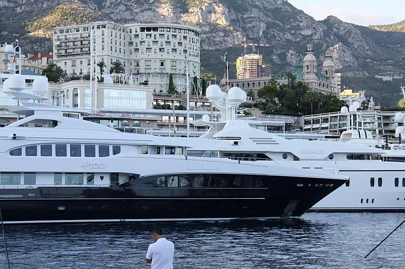 a person standing on a boat aboard 4YOU Yacht for Sale
