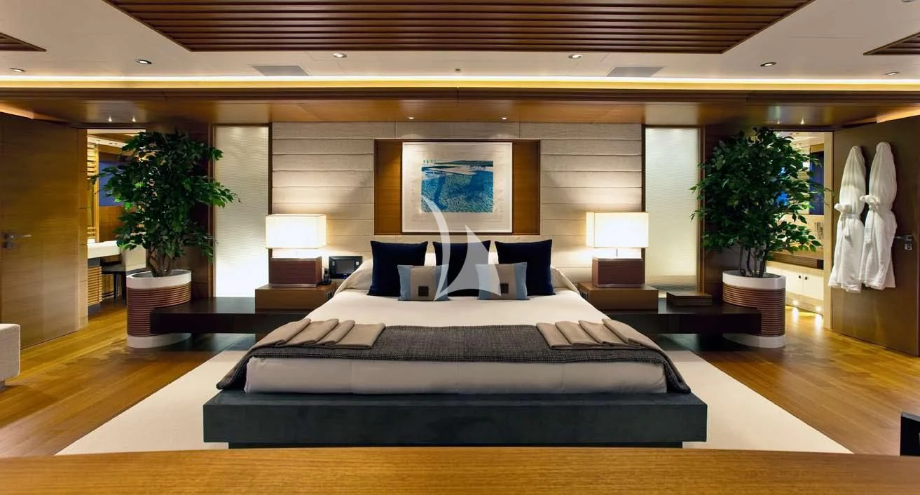 a large room with a bed and a large mirror aboard MARY-JEAN II Yacht for Sale