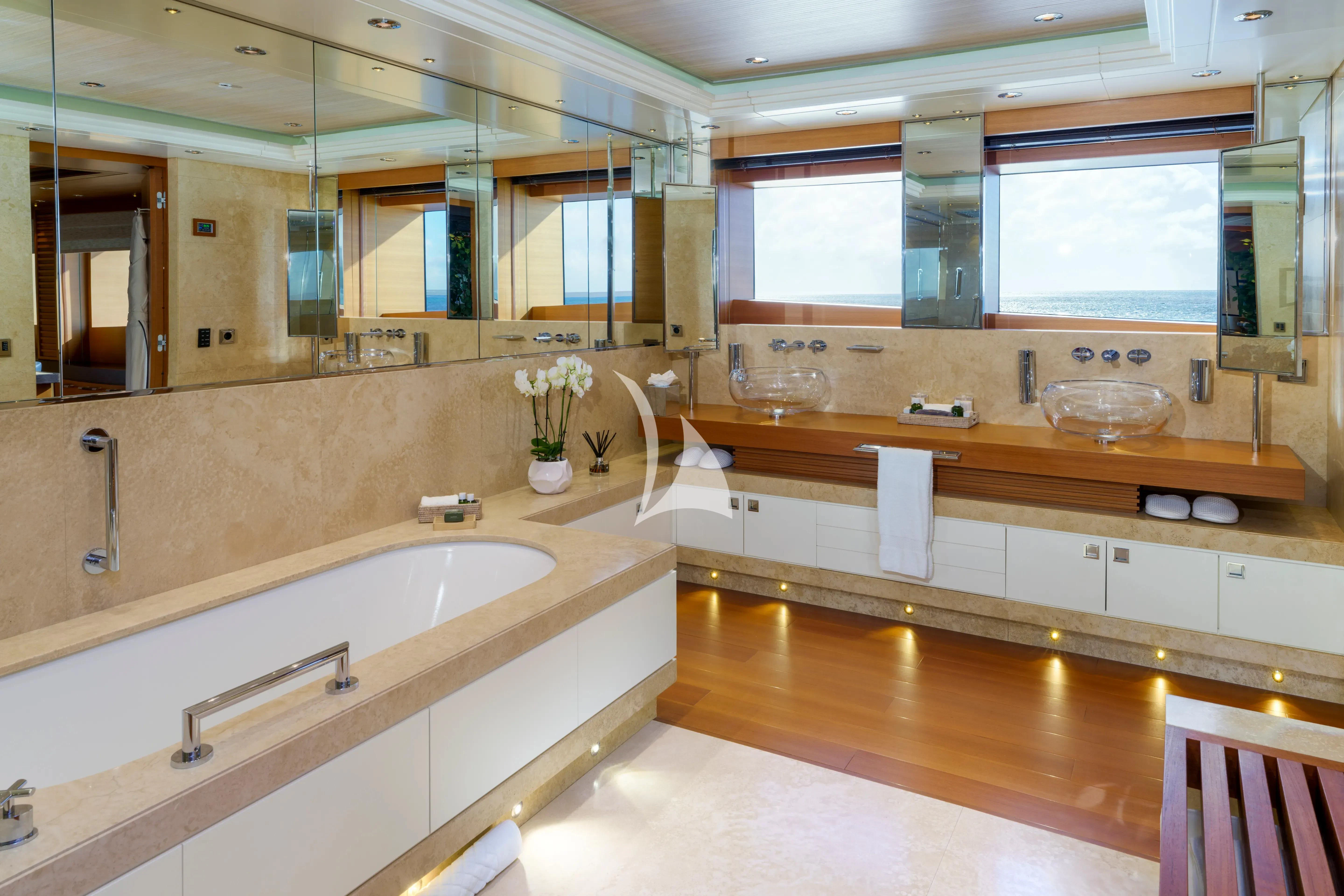 a bathroom with a large mirror aboard MARY-JEAN II Yacht for Sale