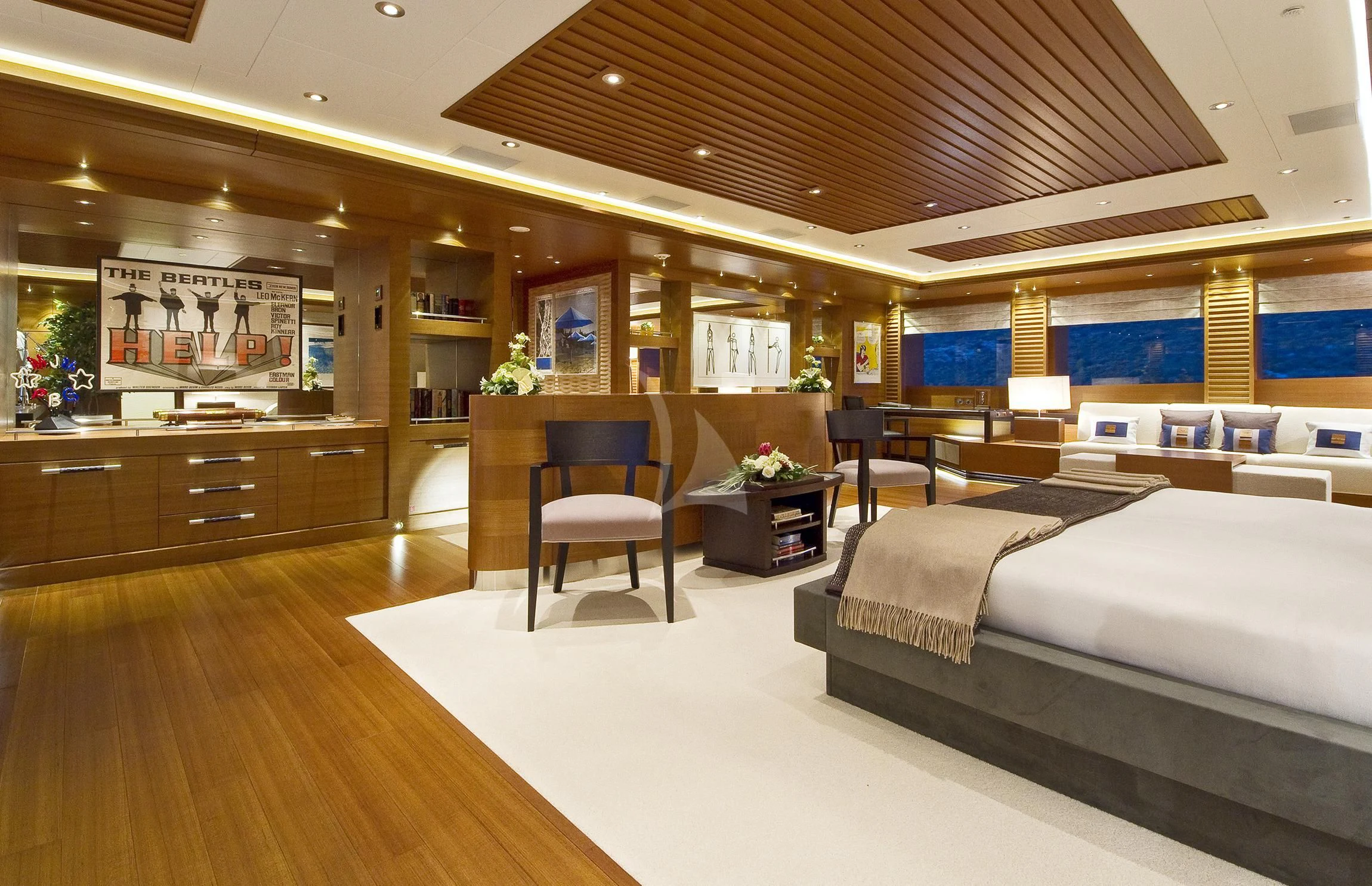 a room with a bed and a chair aboard MARY-JEAN II Yacht for Sale