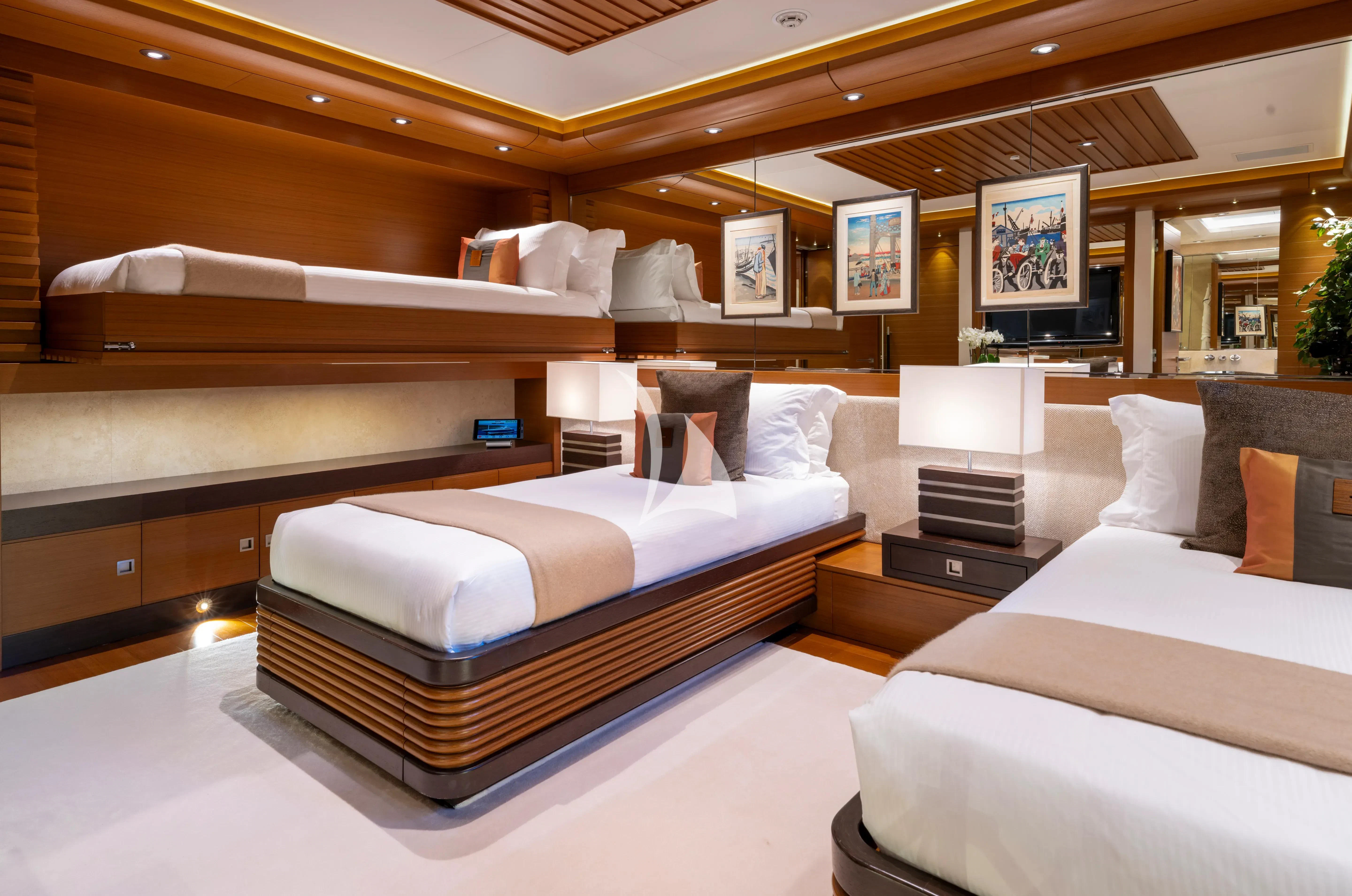 a room with a bed and a couch aboard MARY-JEAN II Yacht for Sale
