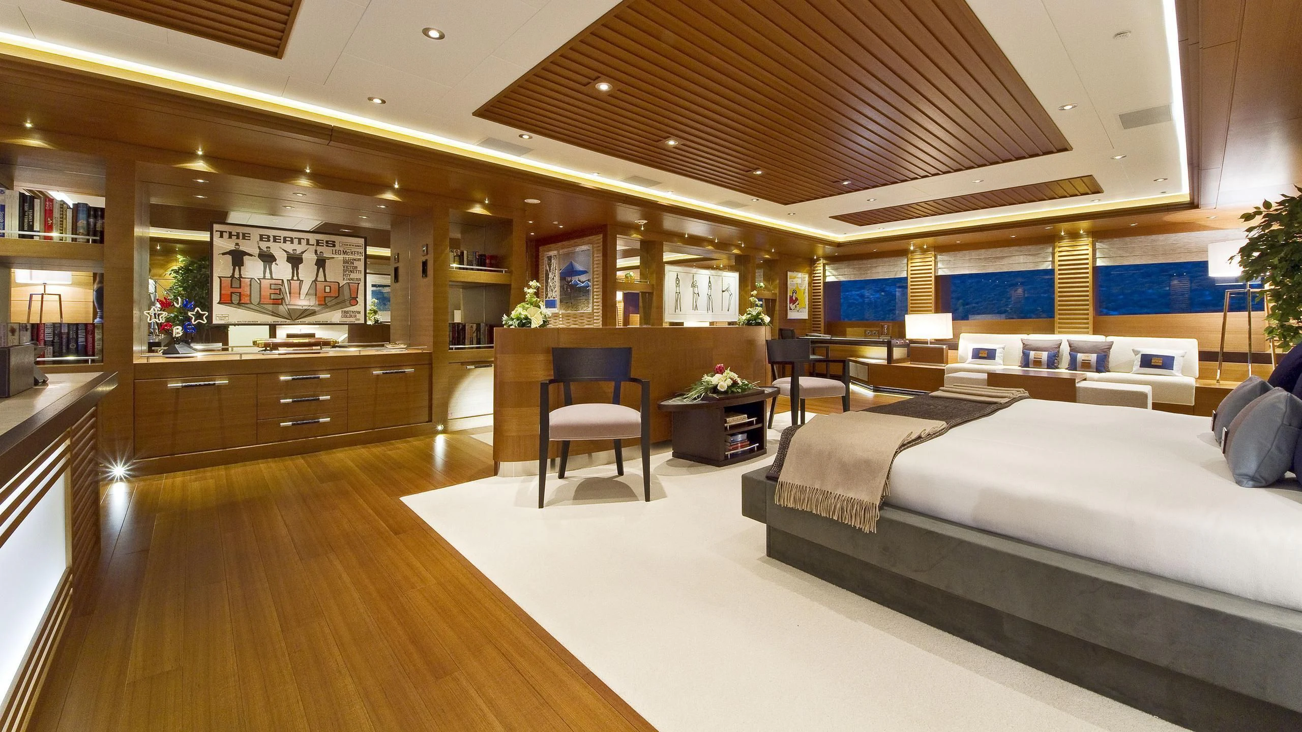 a room with a bed and a chair aboard MARY-JEAN II Yacht for Sale