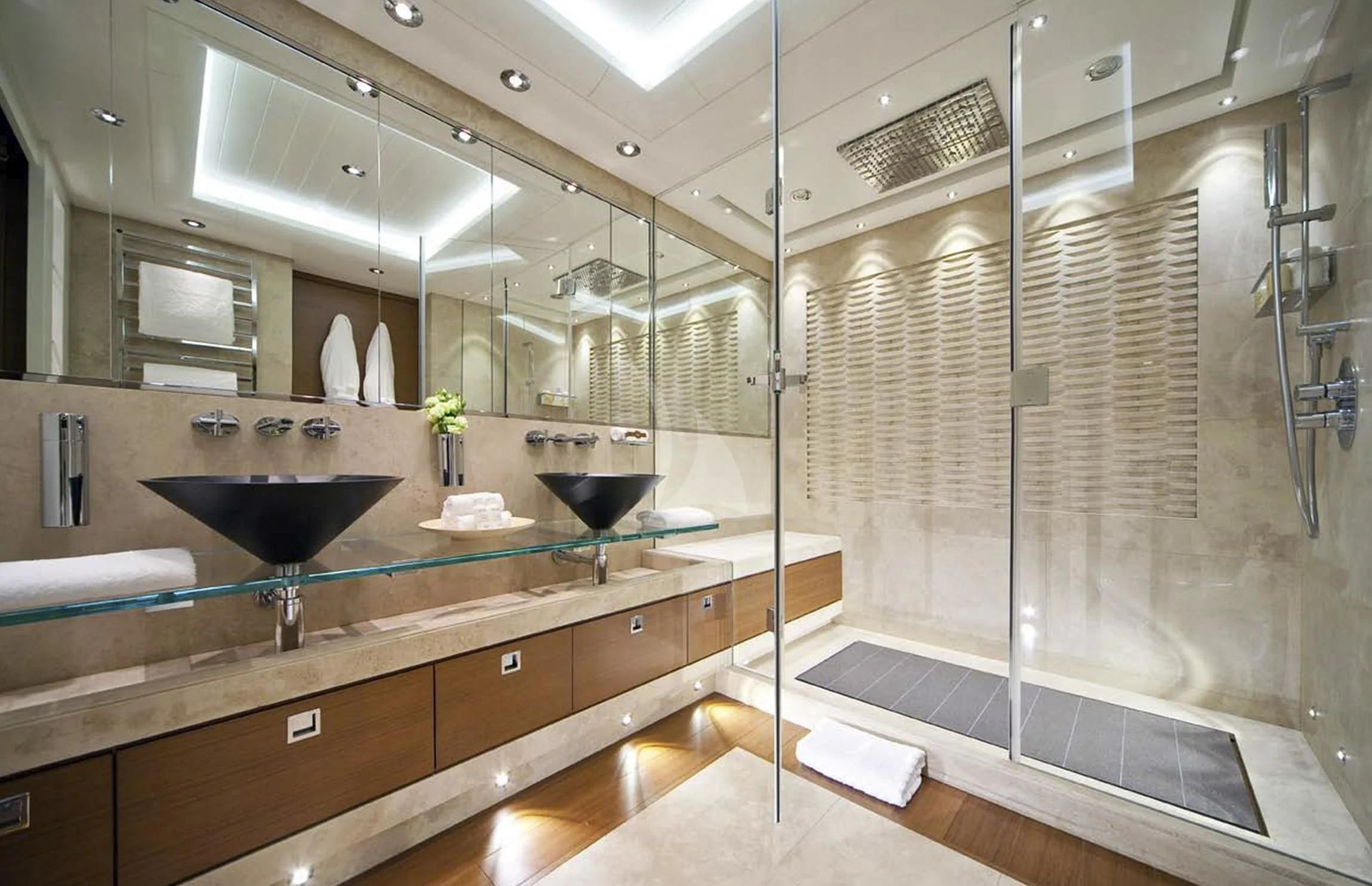 a bathroom with a glass shower aboard MARY-JEAN II Yacht for Sale