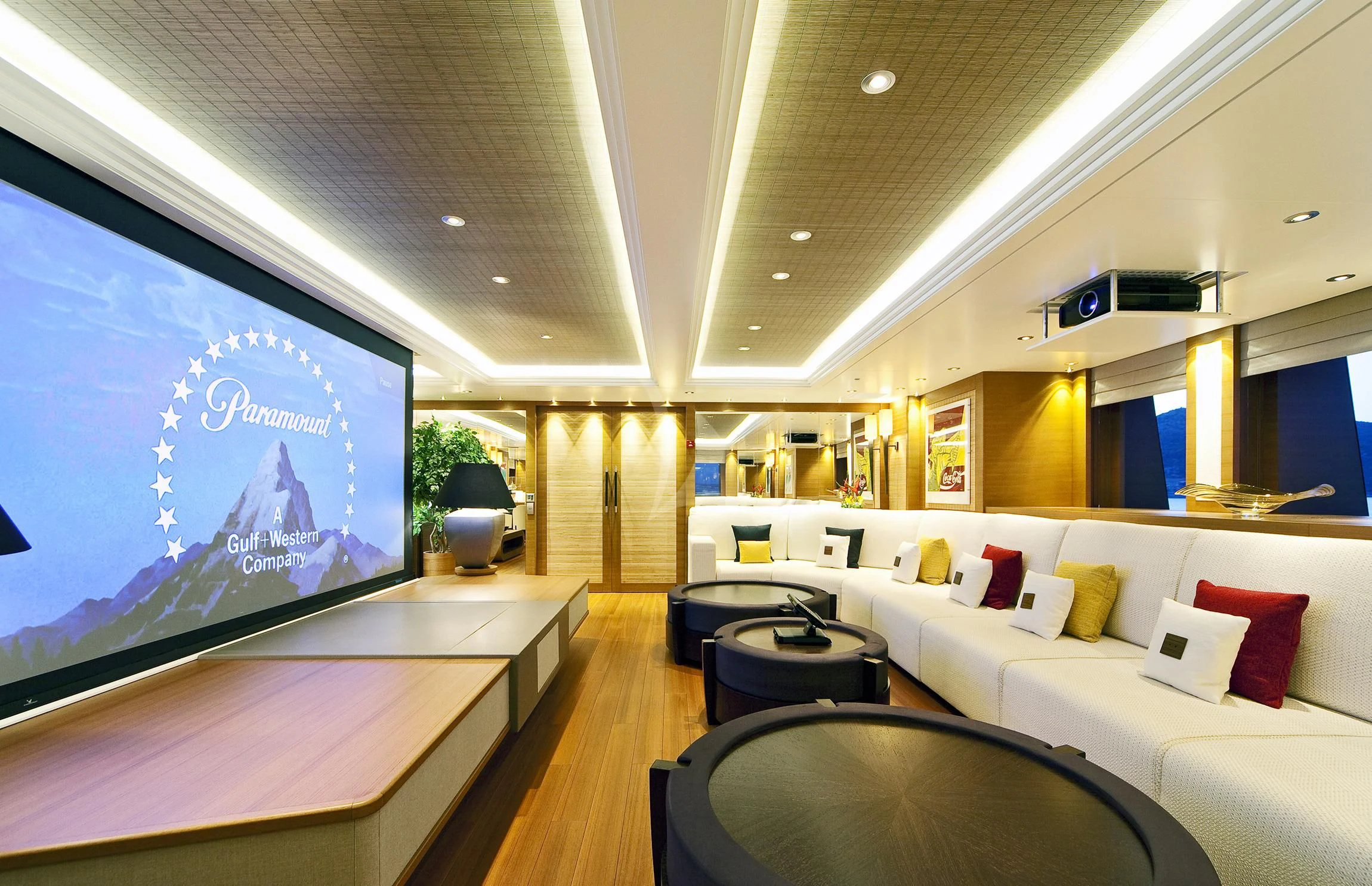 a large living room with a large screen aboard MARY-JEAN II Yacht for Sale