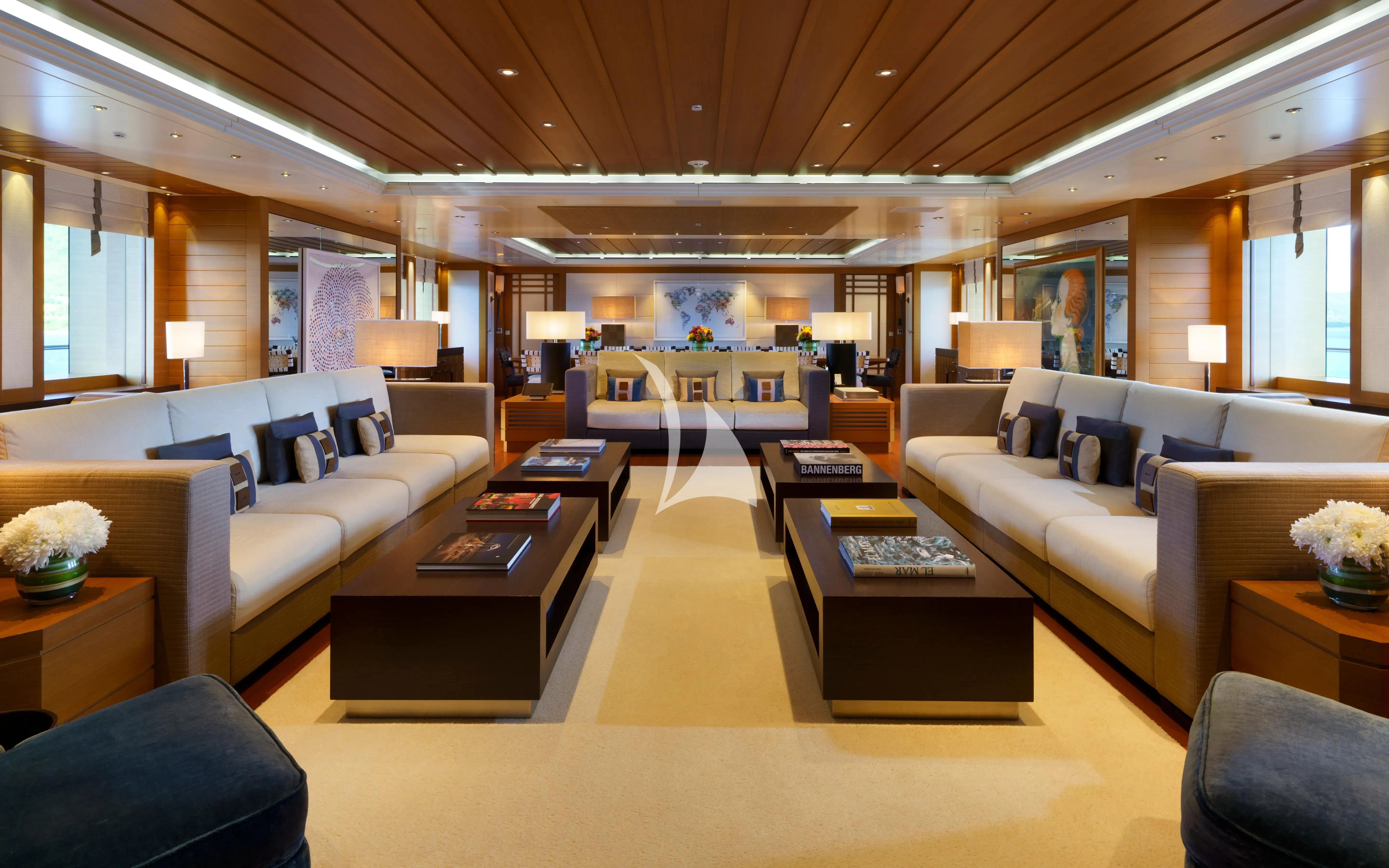 a living room with a couch and a coffee table aboard MARY-JEAN II Yacht for Sale