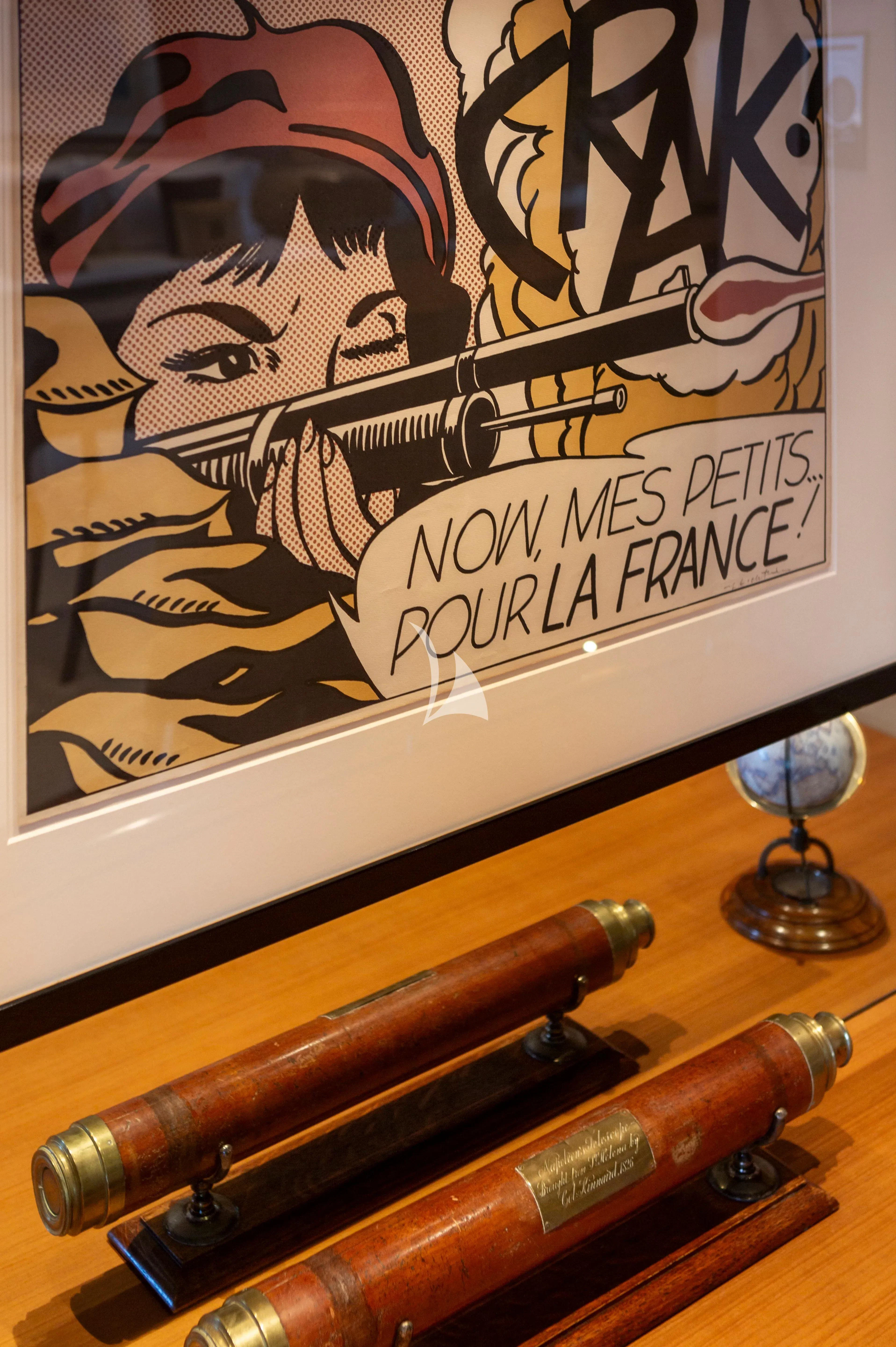 a group of cigarettes and a glass on a table aboard MARY-JEAN II Yacht for Sale