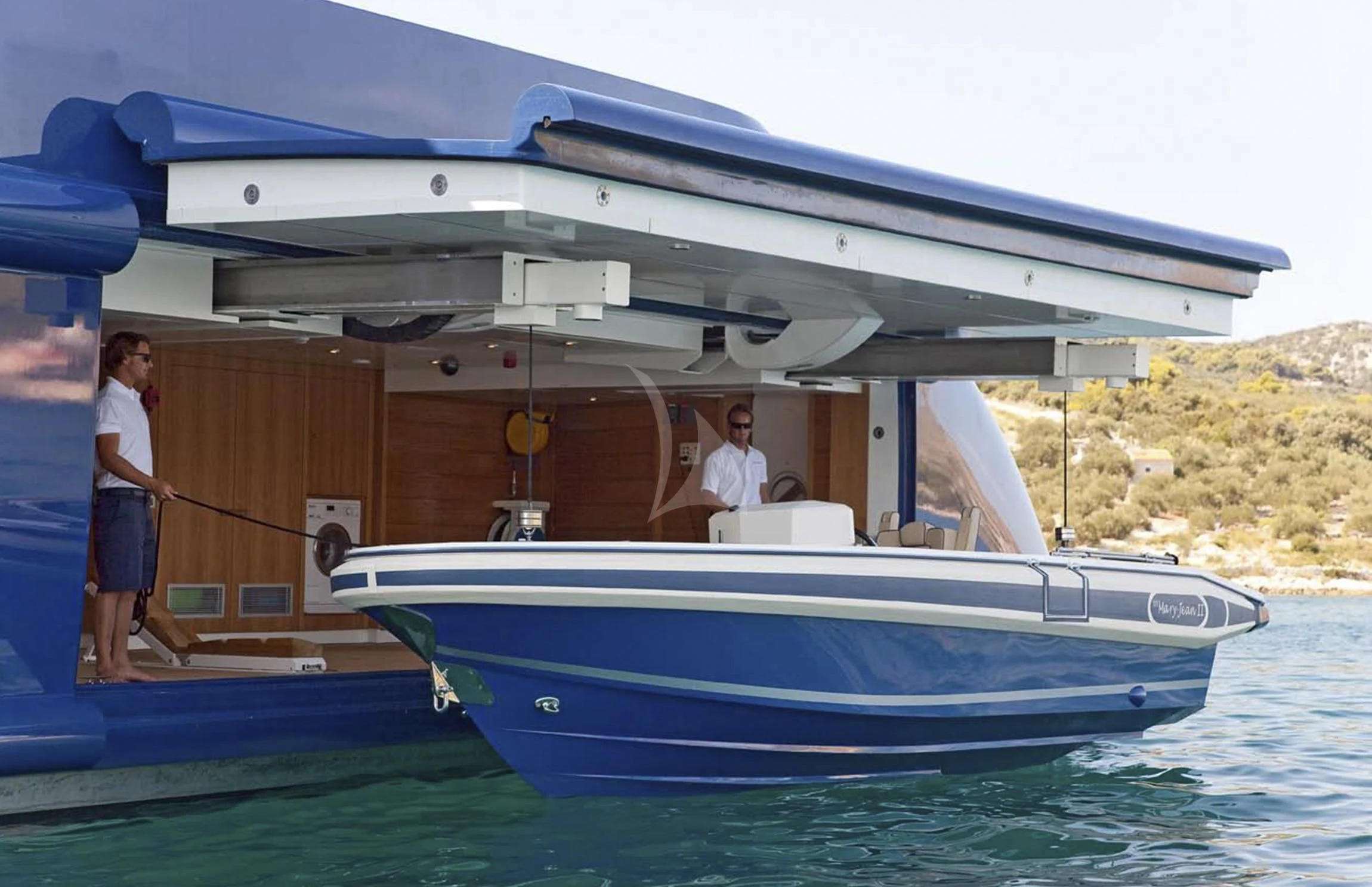 a man and a woman on a boat aboard MARY-JEAN II Yacht for Sale