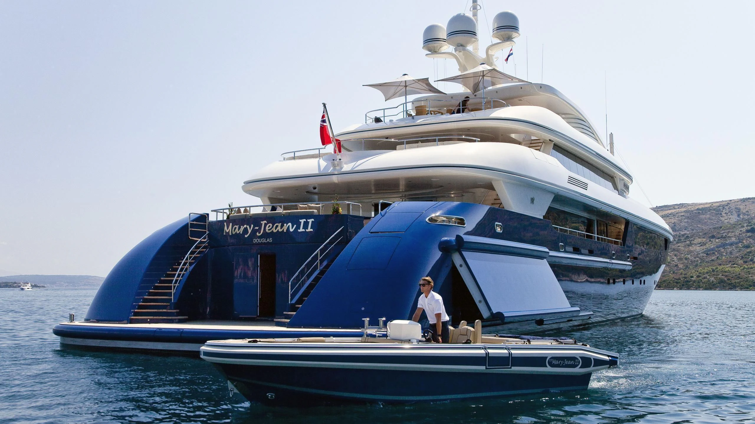 a boat with a person on it aboard MARY-JEAN II Yacht for Sale