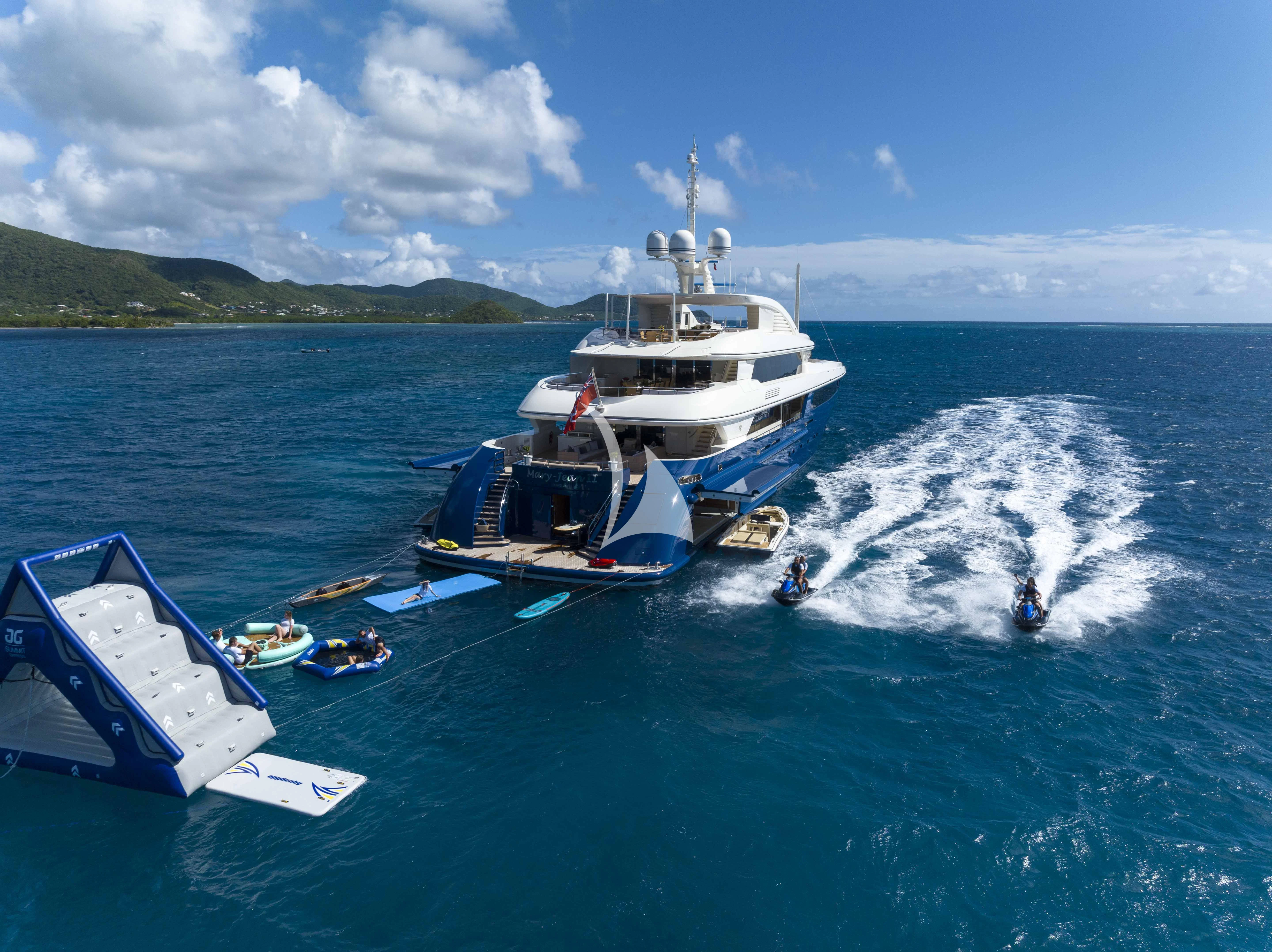 a boat and a boat on the water aboard MARY-JEAN II Yacht for Sale