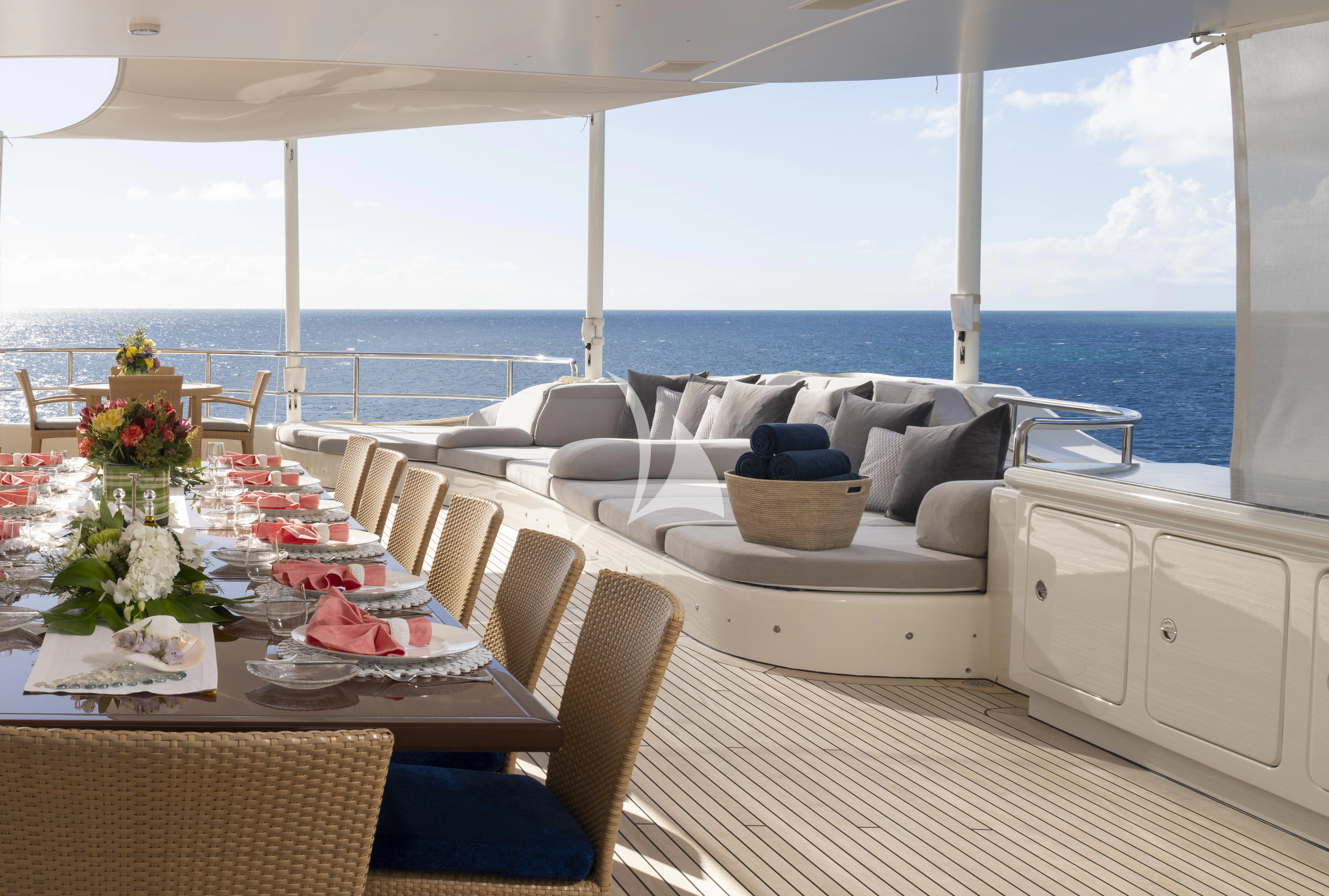 a room with a table and chairs aboard MARY-JEAN II Yacht for Sale