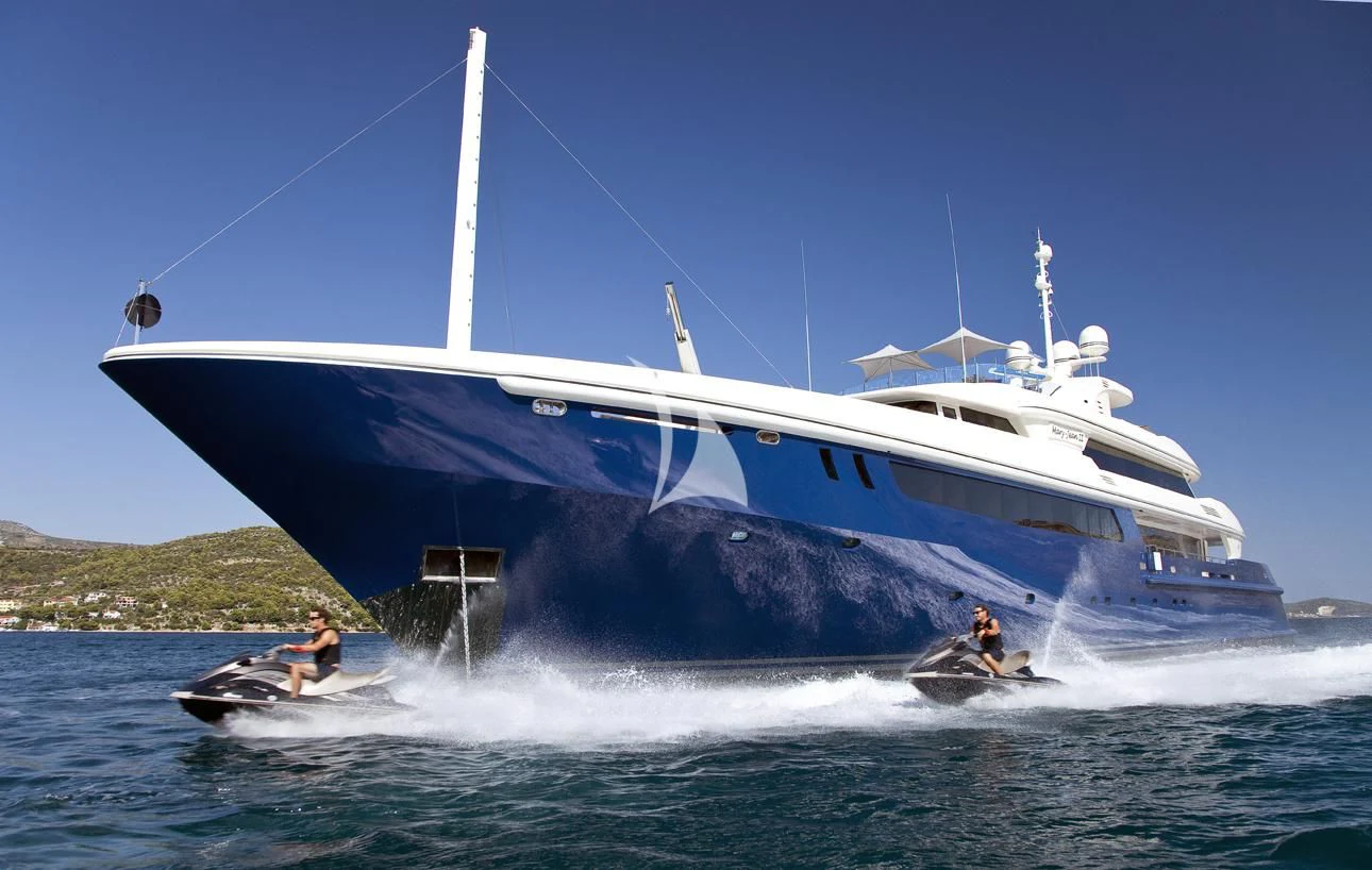 a boat with a large sail aboard MARY-JEAN II Yacht for Sale