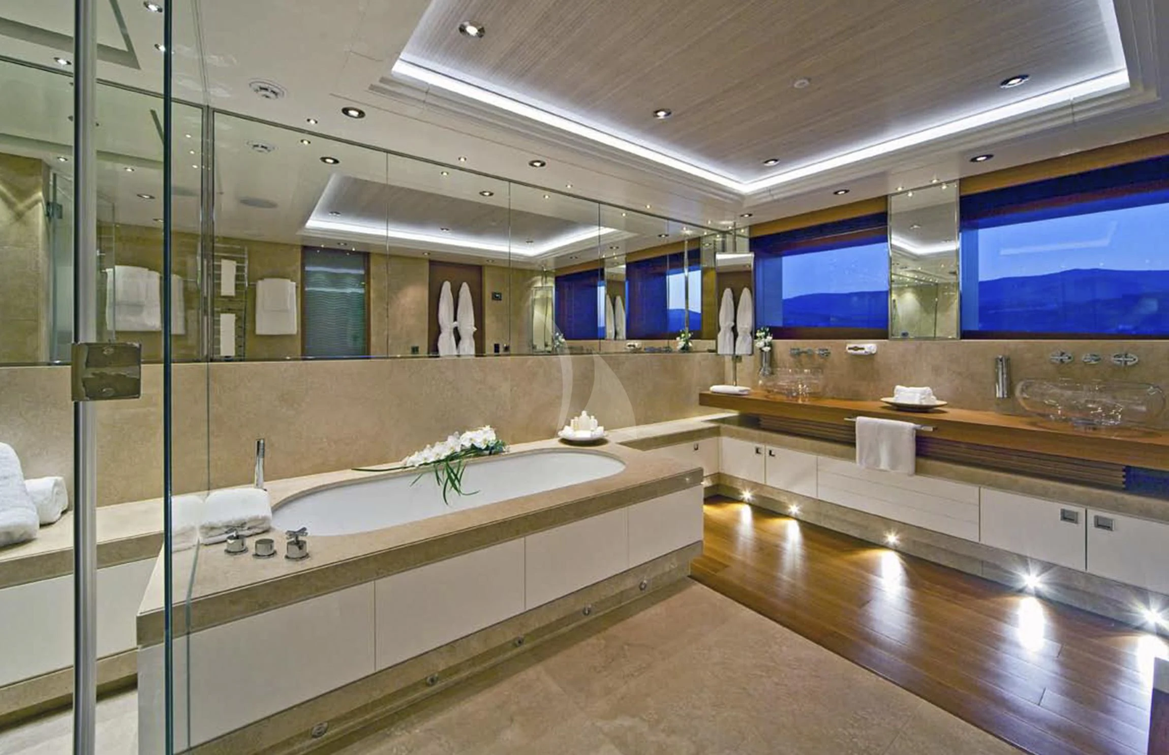 a large bathroom with a large glass shower unit aboard MARY-JEAN II Yacht for Sale