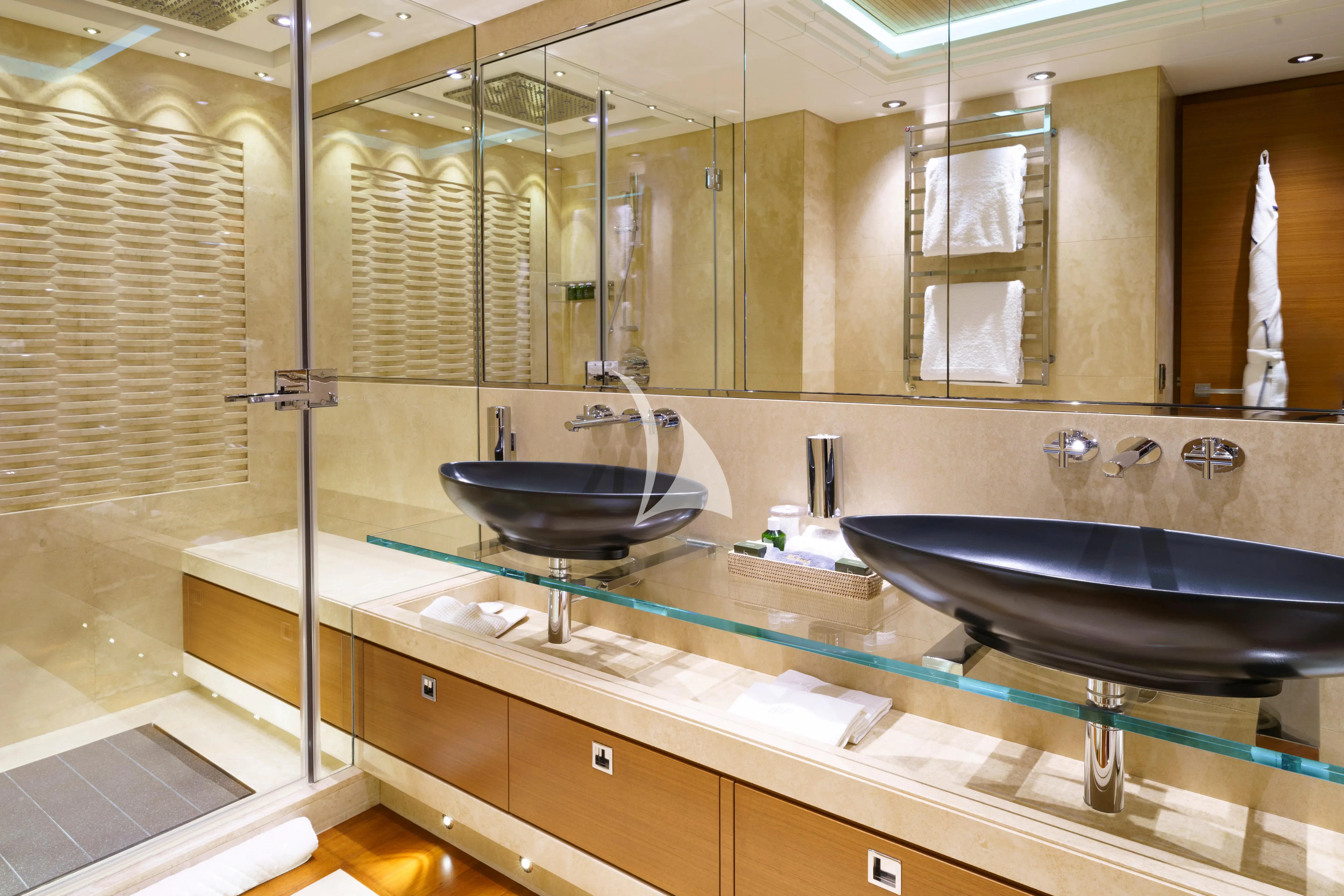 a bathroom with a large mirror aboard MARY-JEAN II Yacht for Sale