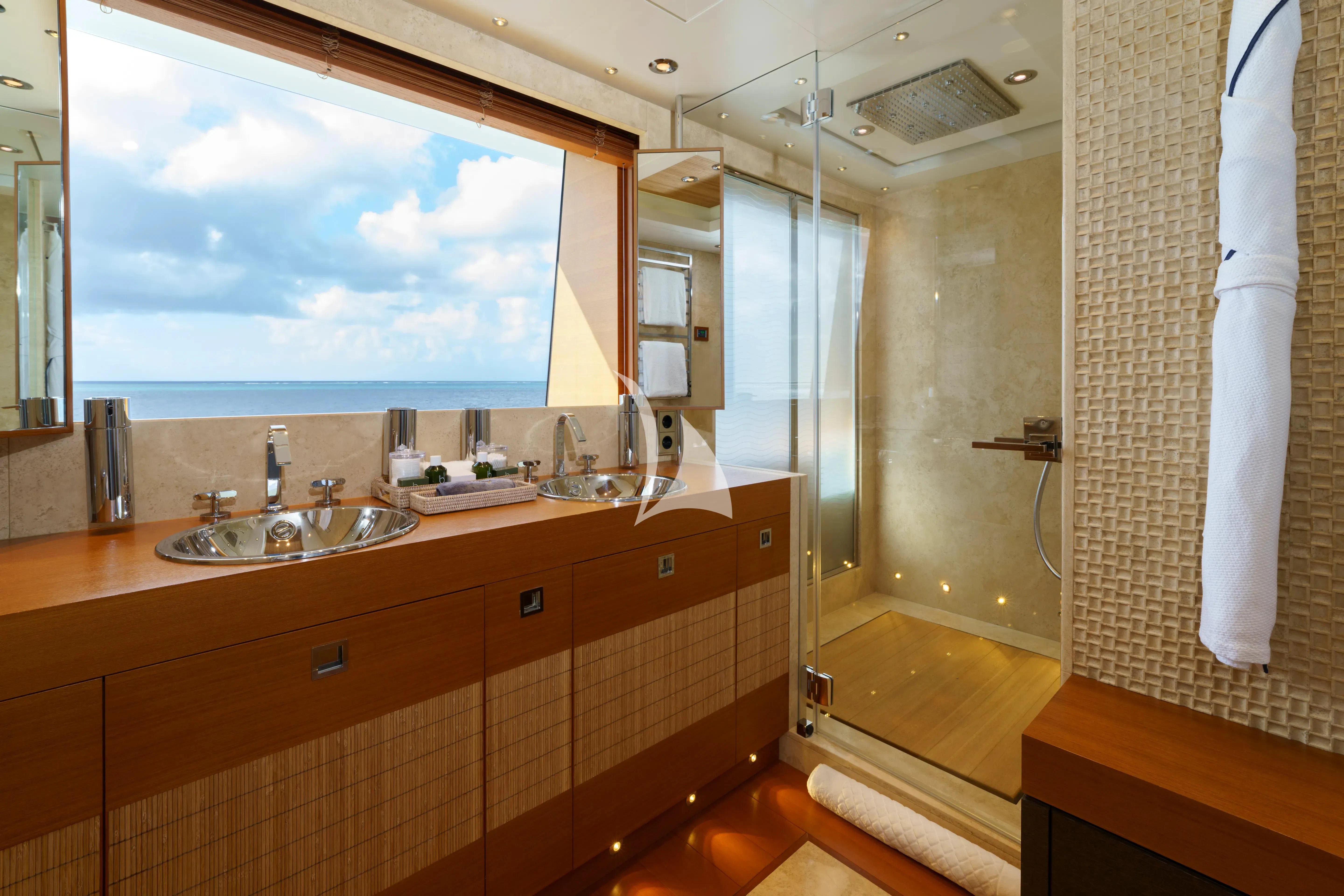 a bathroom with a large window aboard MARY-JEAN II Yacht for Sale