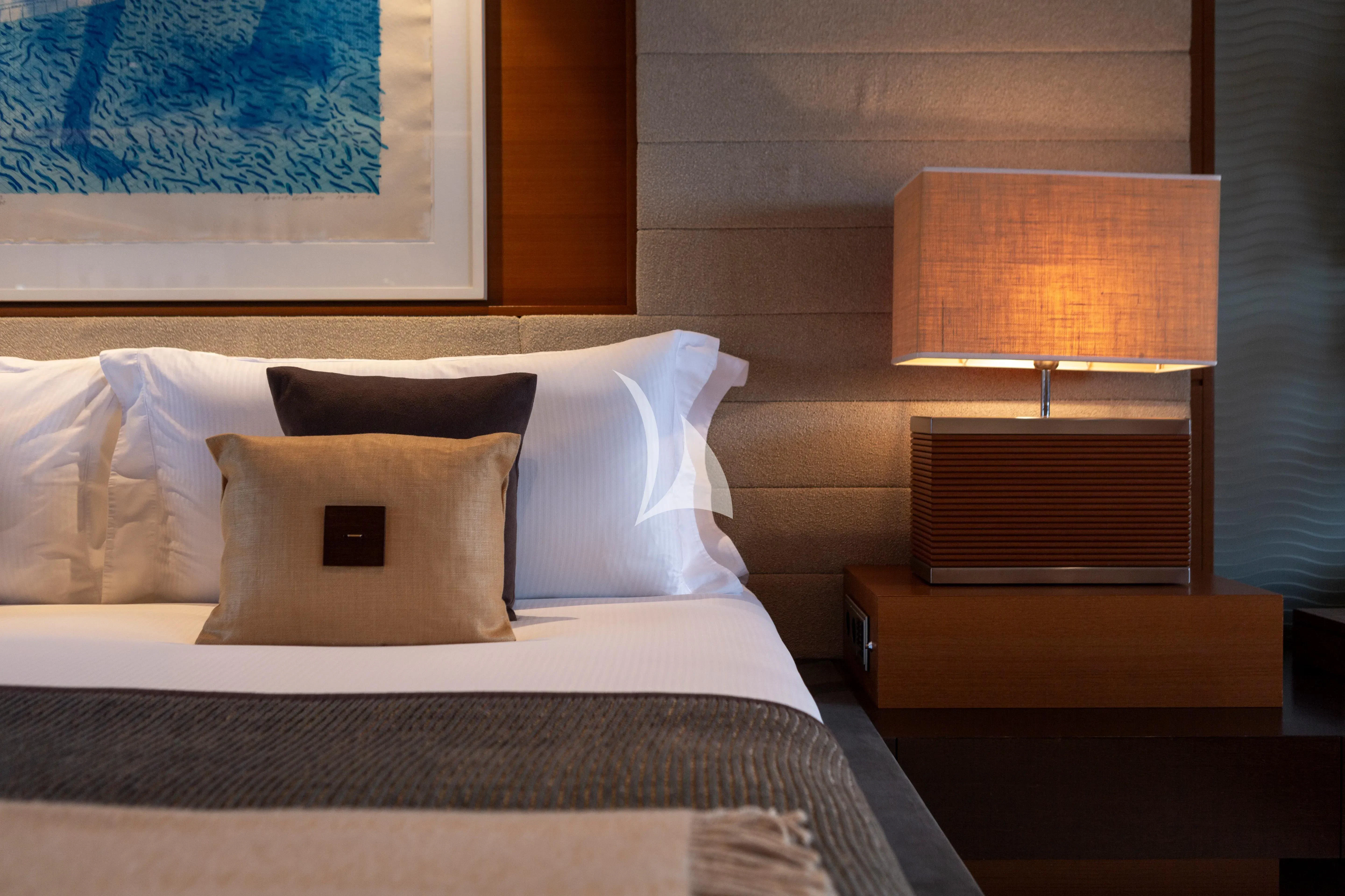 a bed with a pillow and pillows aboard MARY-JEAN II Yacht for Sale