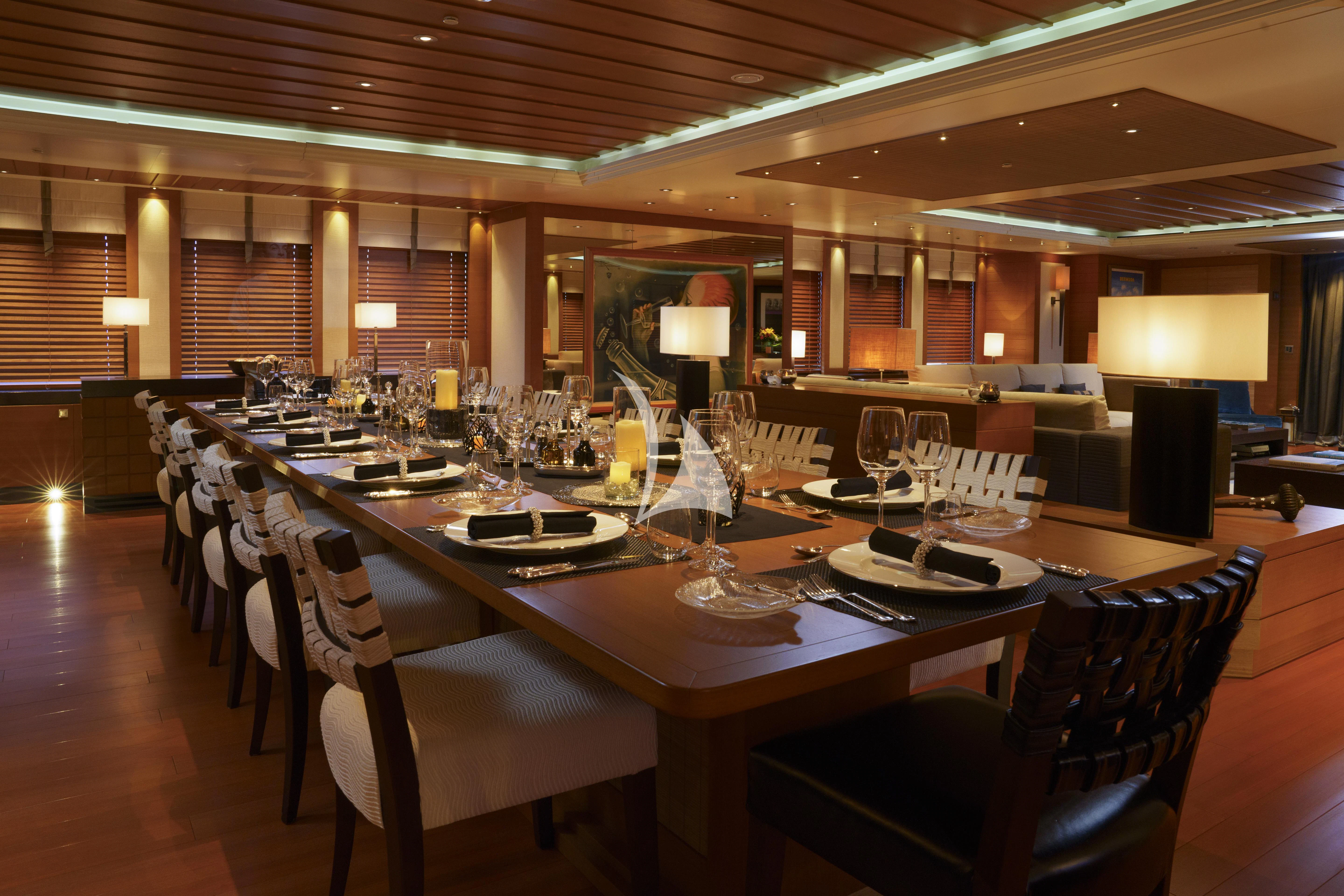 a large room with tables and chairs aboard MARY-JEAN II Yacht for Sale