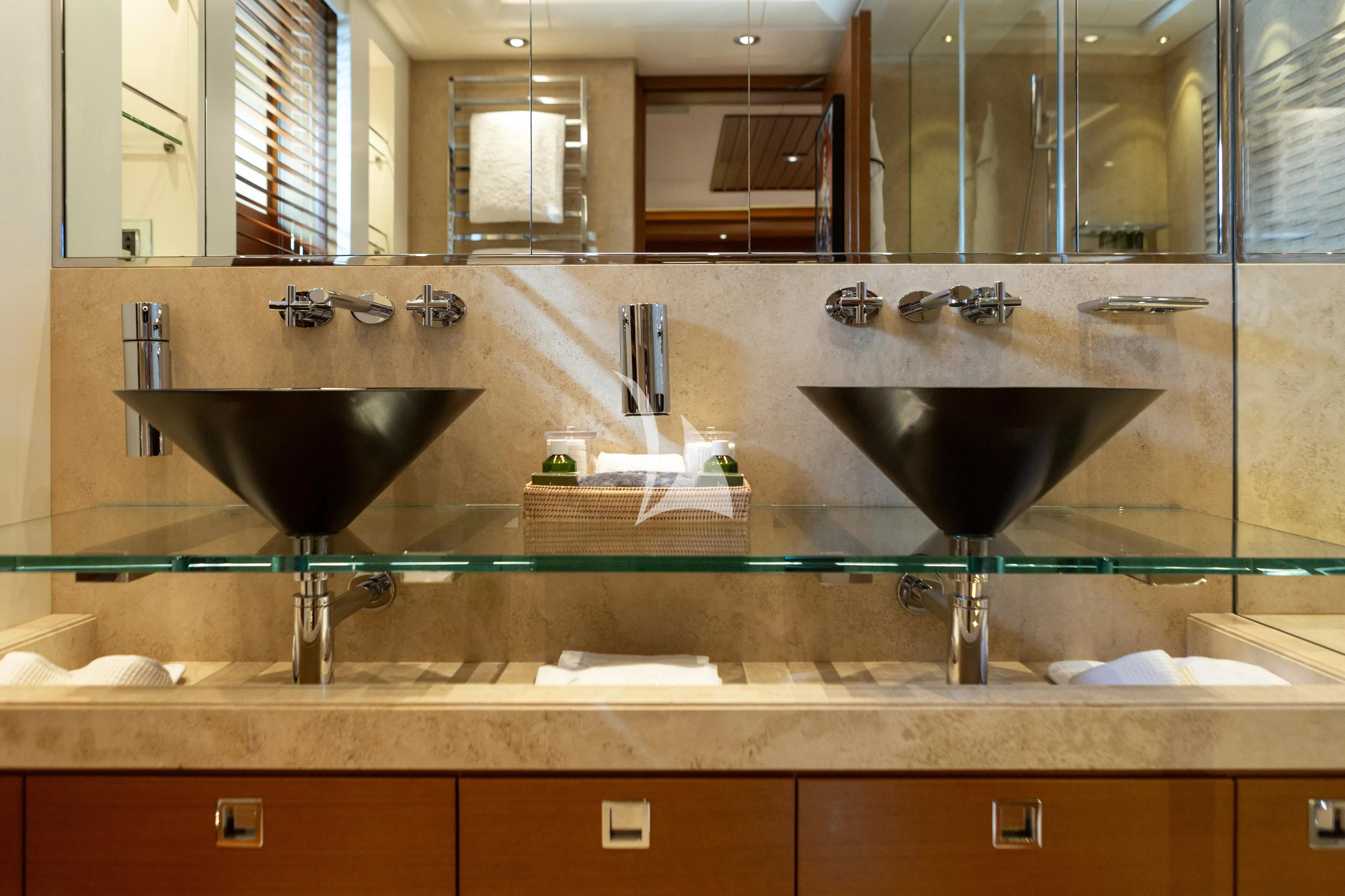 a bathroom with a large black sink aboard MARY-JEAN II Yacht for Sale