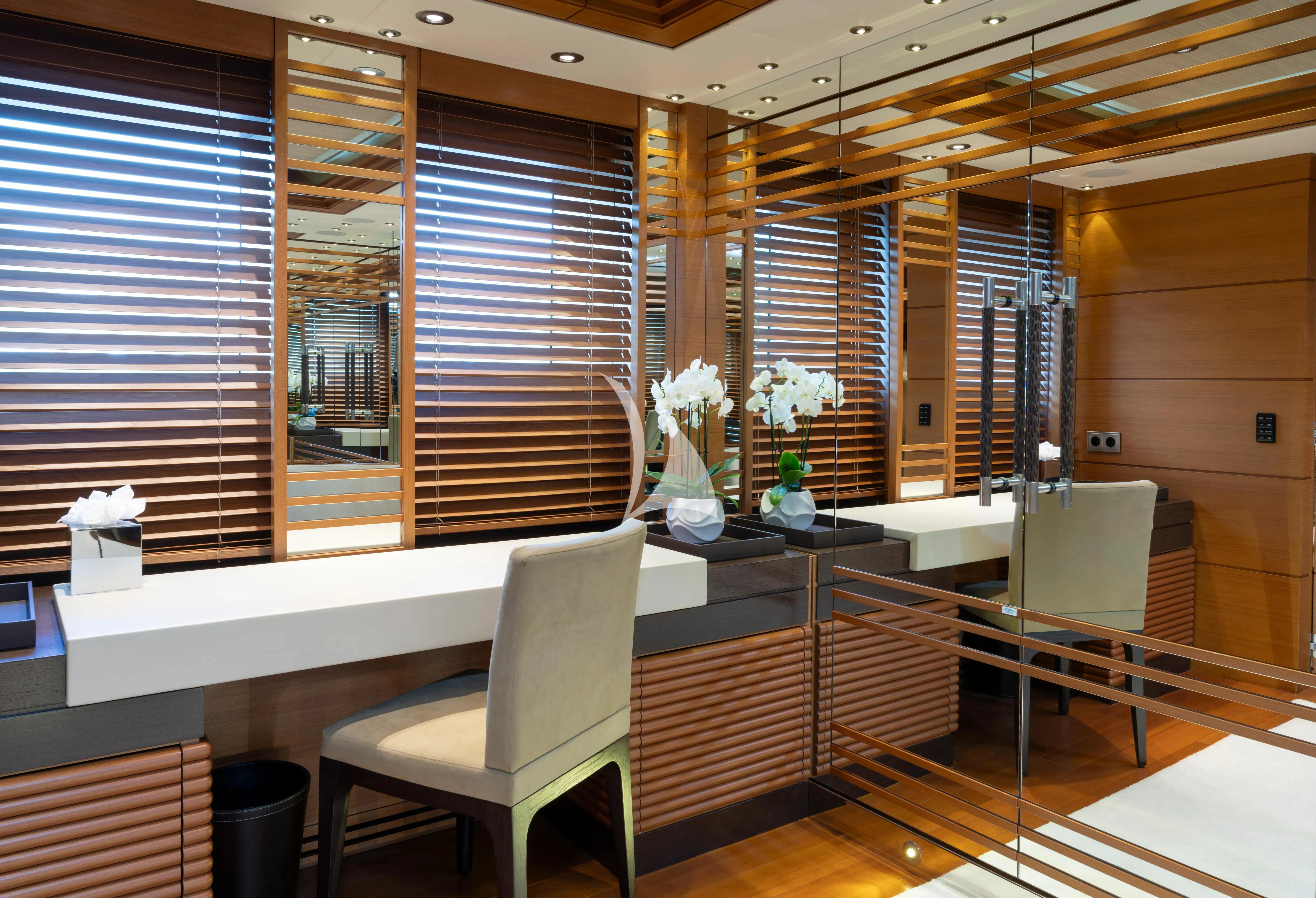 a room with a table chairs and a window aboard MARY-JEAN II Yacht for Sale