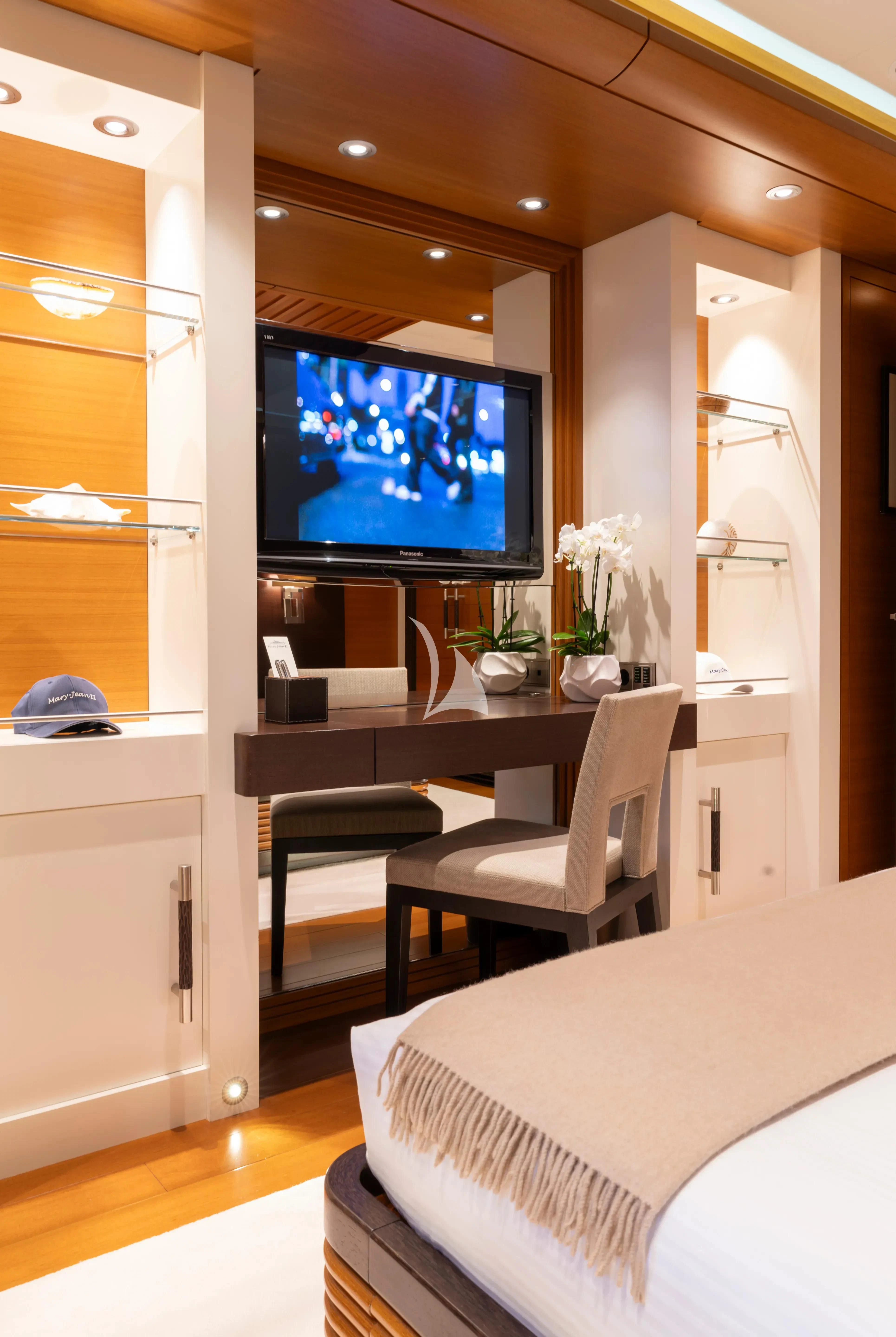 a room with a tv and a bed aboard MARY-JEAN II Yacht for Sale