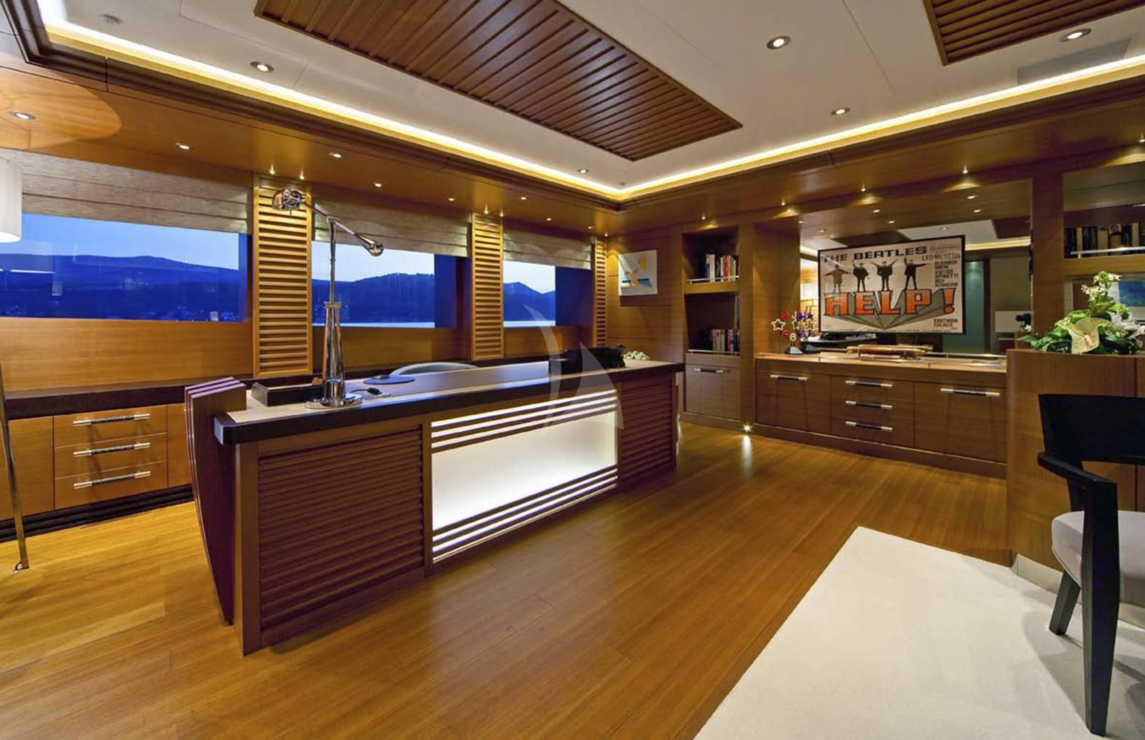 a kitchen with a large island aboard MARY-JEAN II Yacht for Sale