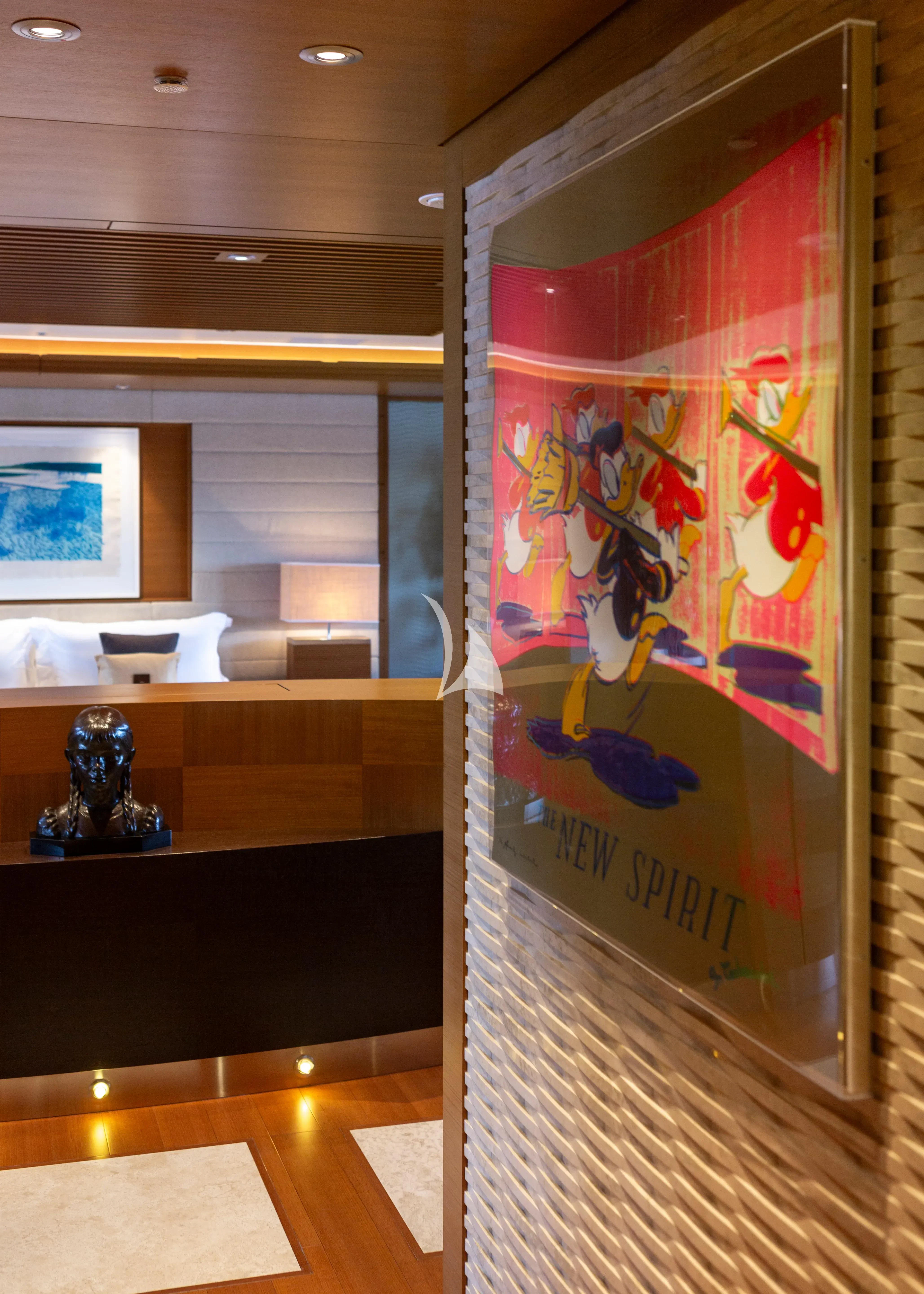 a glass display case with a colorful painting on it aboard MARY-JEAN II Yacht for Sale