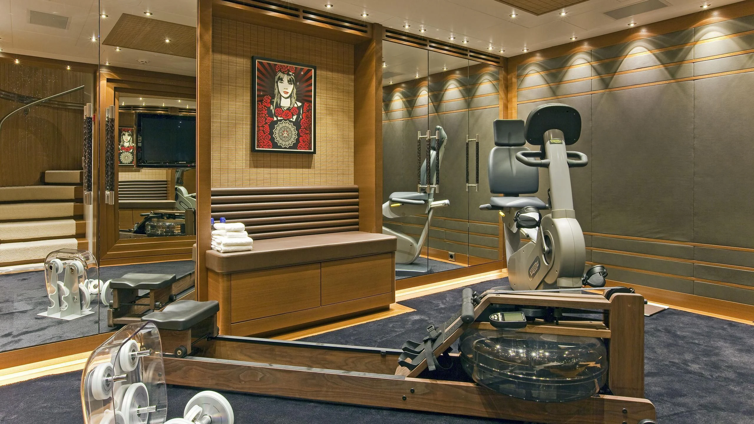 a room with a large mirror and a statue aboard MARY-JEAN II Yacht for Sale