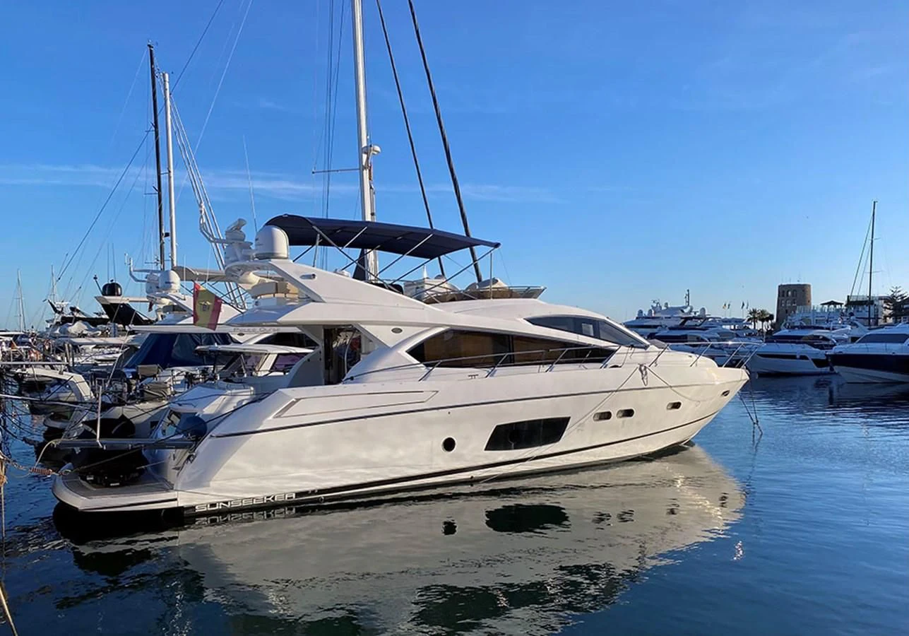 a boat docked at a pier aboard LIO Yacht for Sale