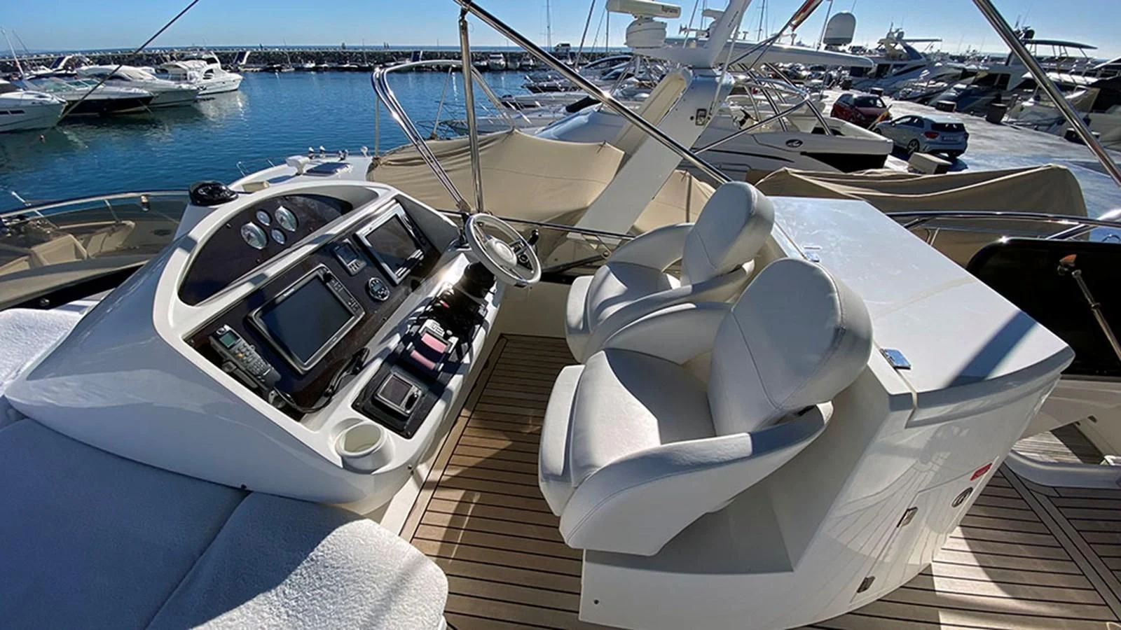 a boat parked on a dock aboard LIO Yacht for Sale