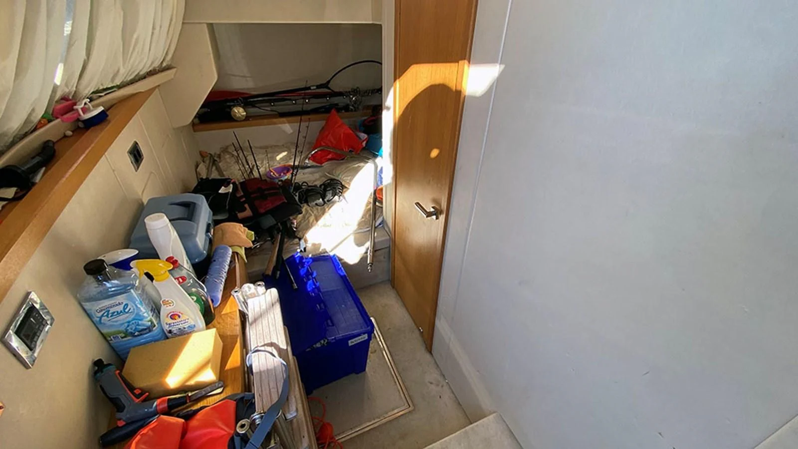 a room with a lot of clutter aboard LIO Yacht for Sale