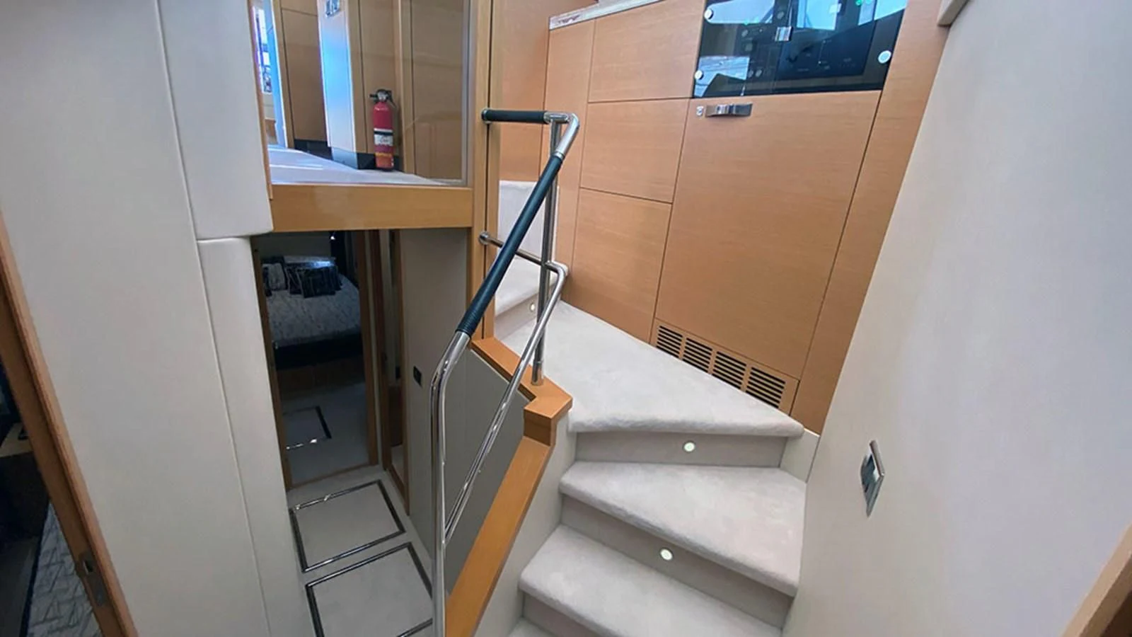 a staircase in a room aboard LIO Yacht for Sale