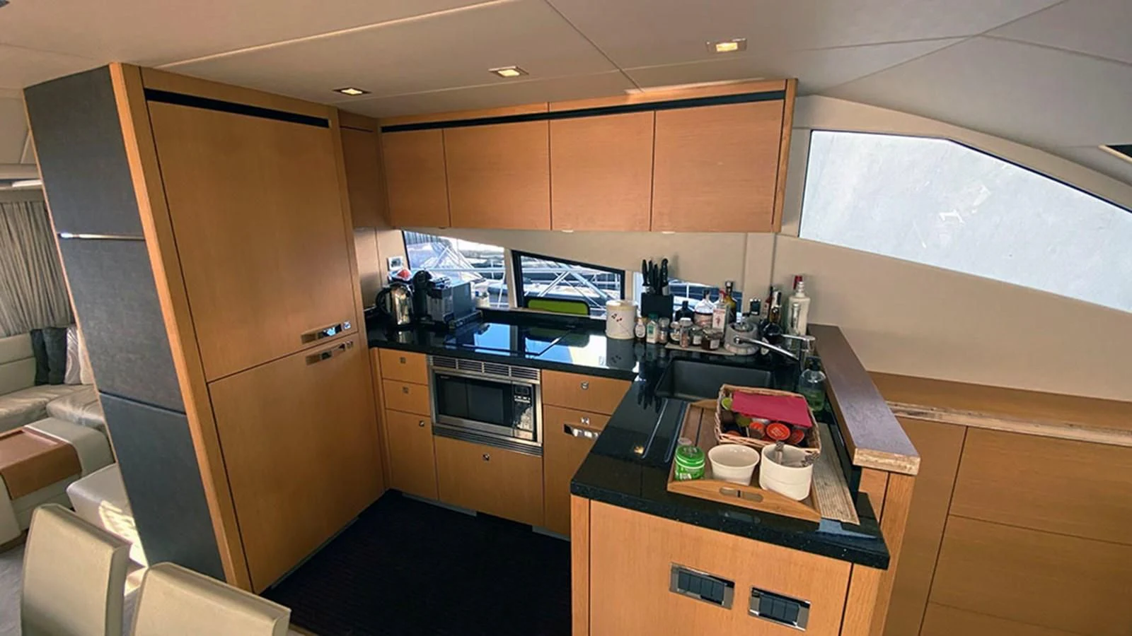 a kitchen with a counter and cabinets aboard LIO Yacht for Sale