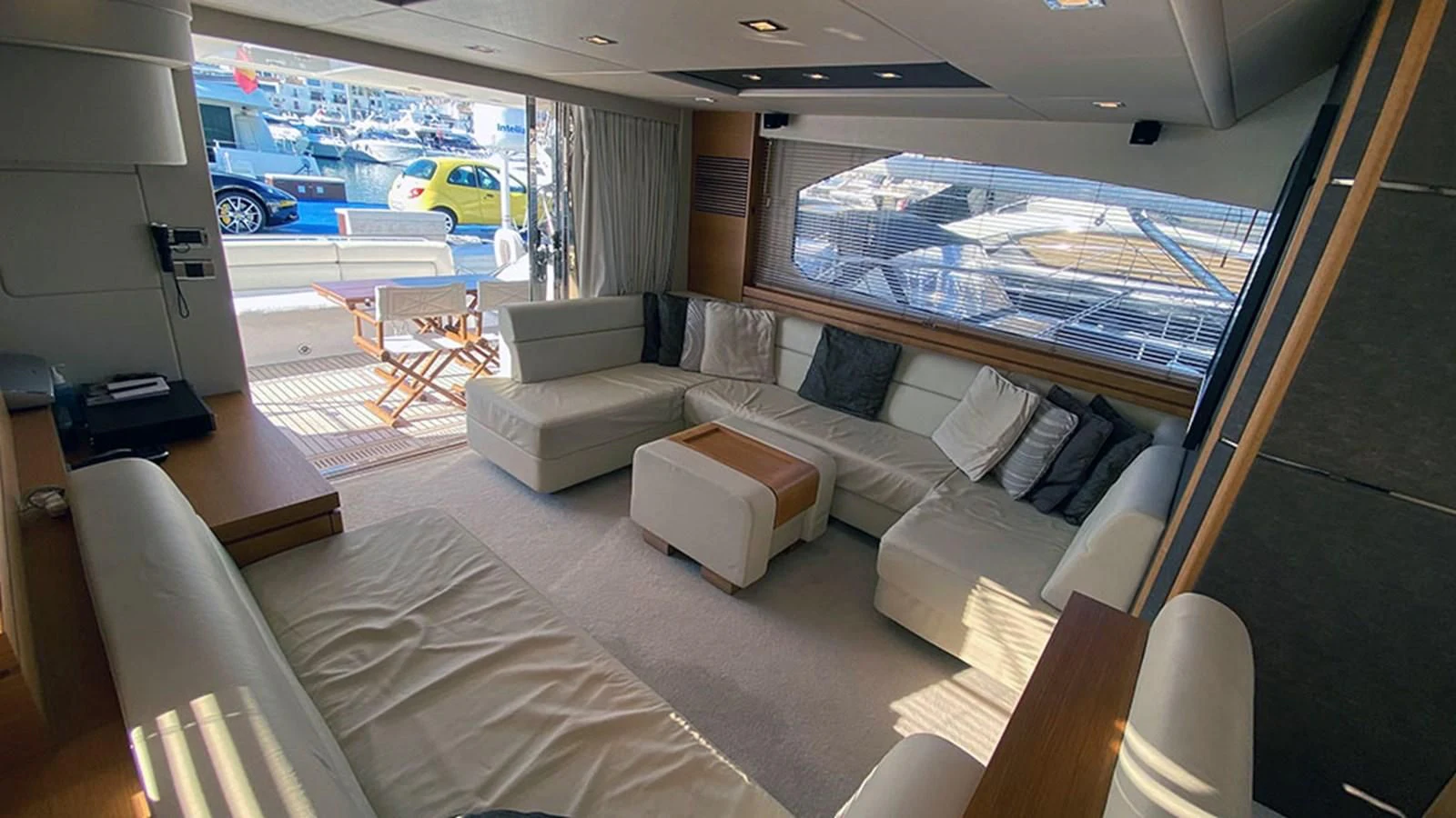 a room with a bed and a couch aboard LIO Yacht for Sale