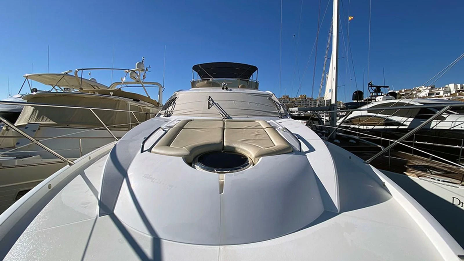 a white yacht in the water aboard LIO Yacht for Sale
